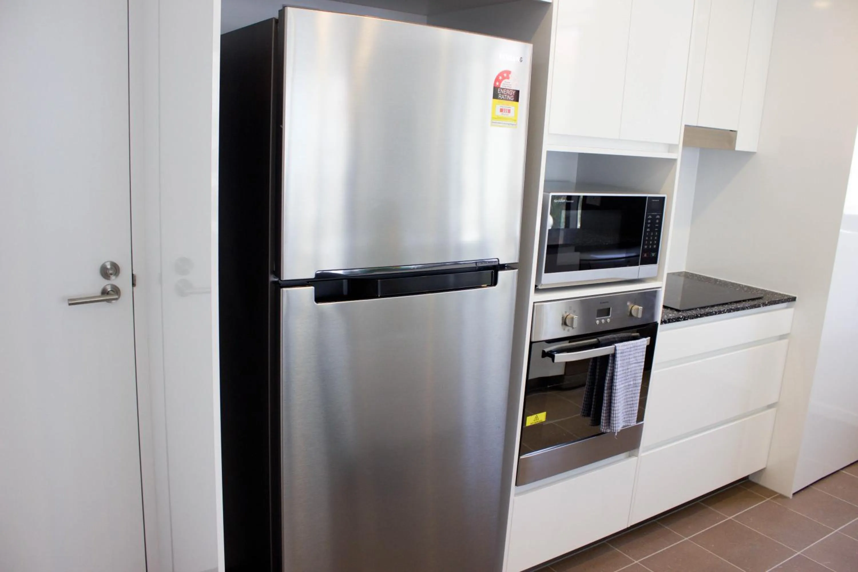 Kitchen or kitchenette in Synergy Broadbeach - Official