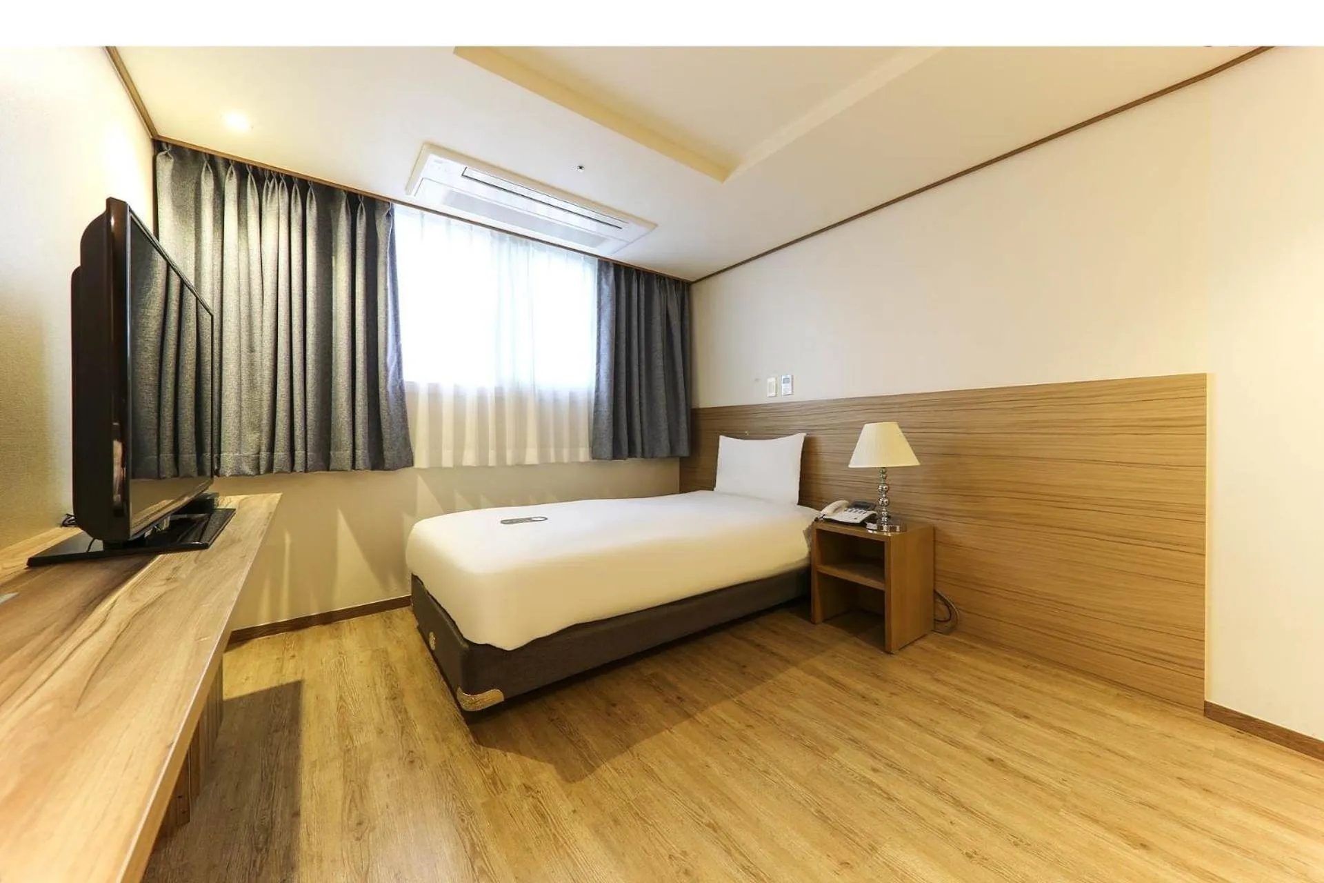 Photo of the whole room, Bed in Hotel Rest Seogwipo