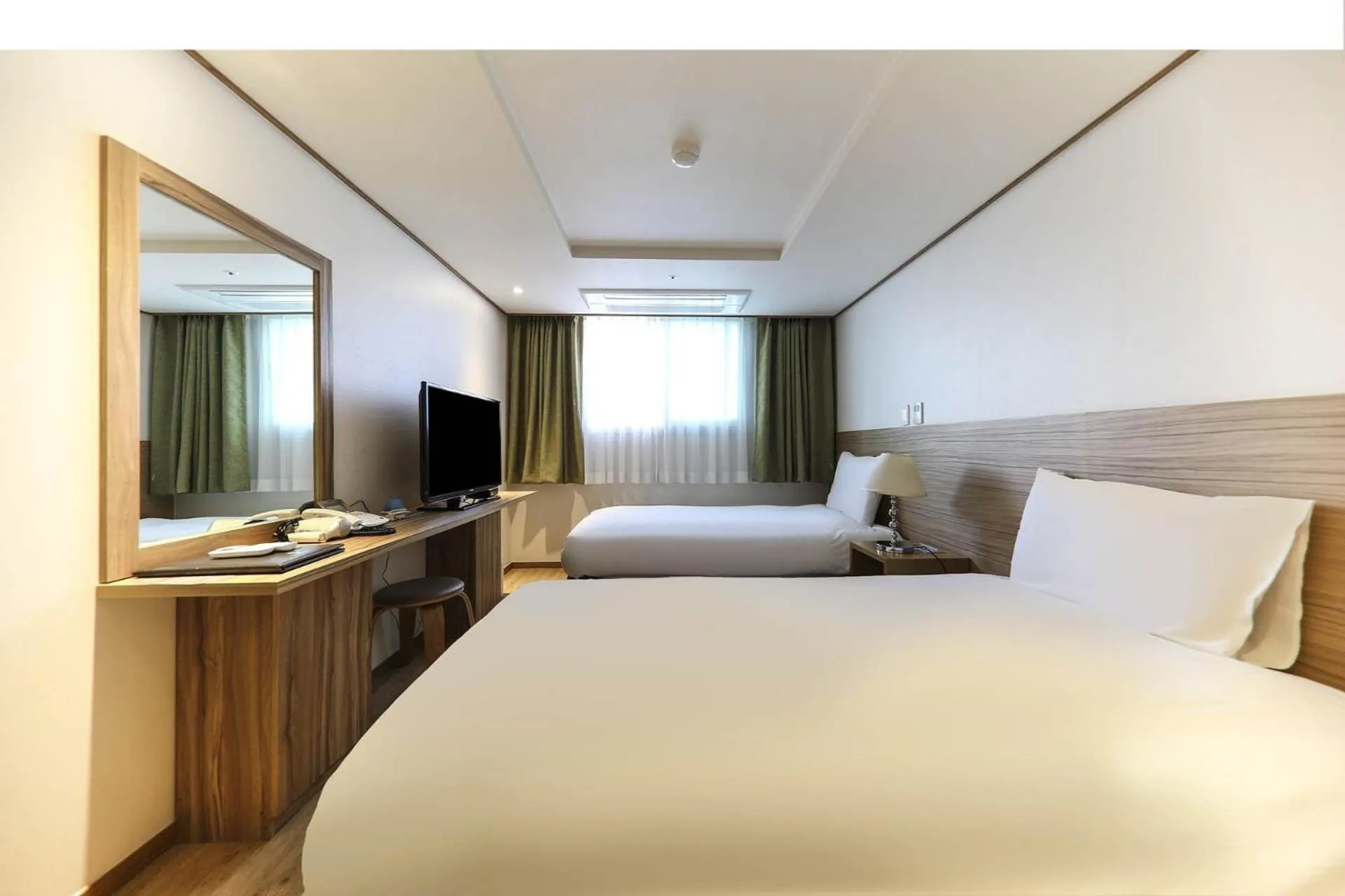 Photo of the whole room, Bed in Hotel Rest Seogwipo