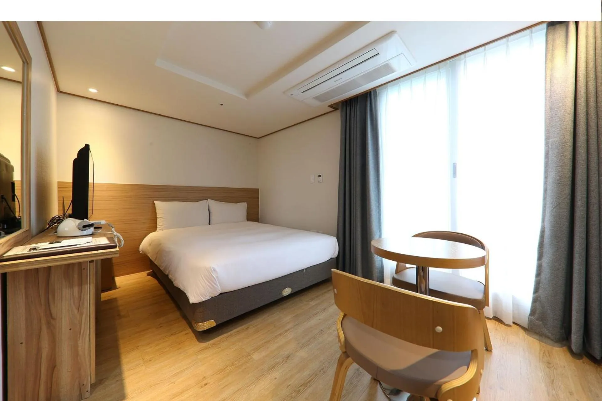 Photo of the whole room, Bed in Hotel Rest Seogwipo