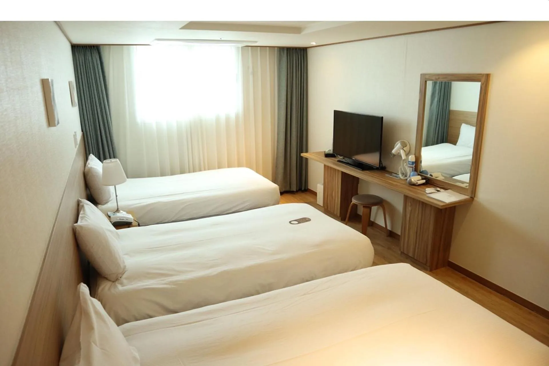 Photo of the whole room, Bed in Hotel Rest Seogwipo