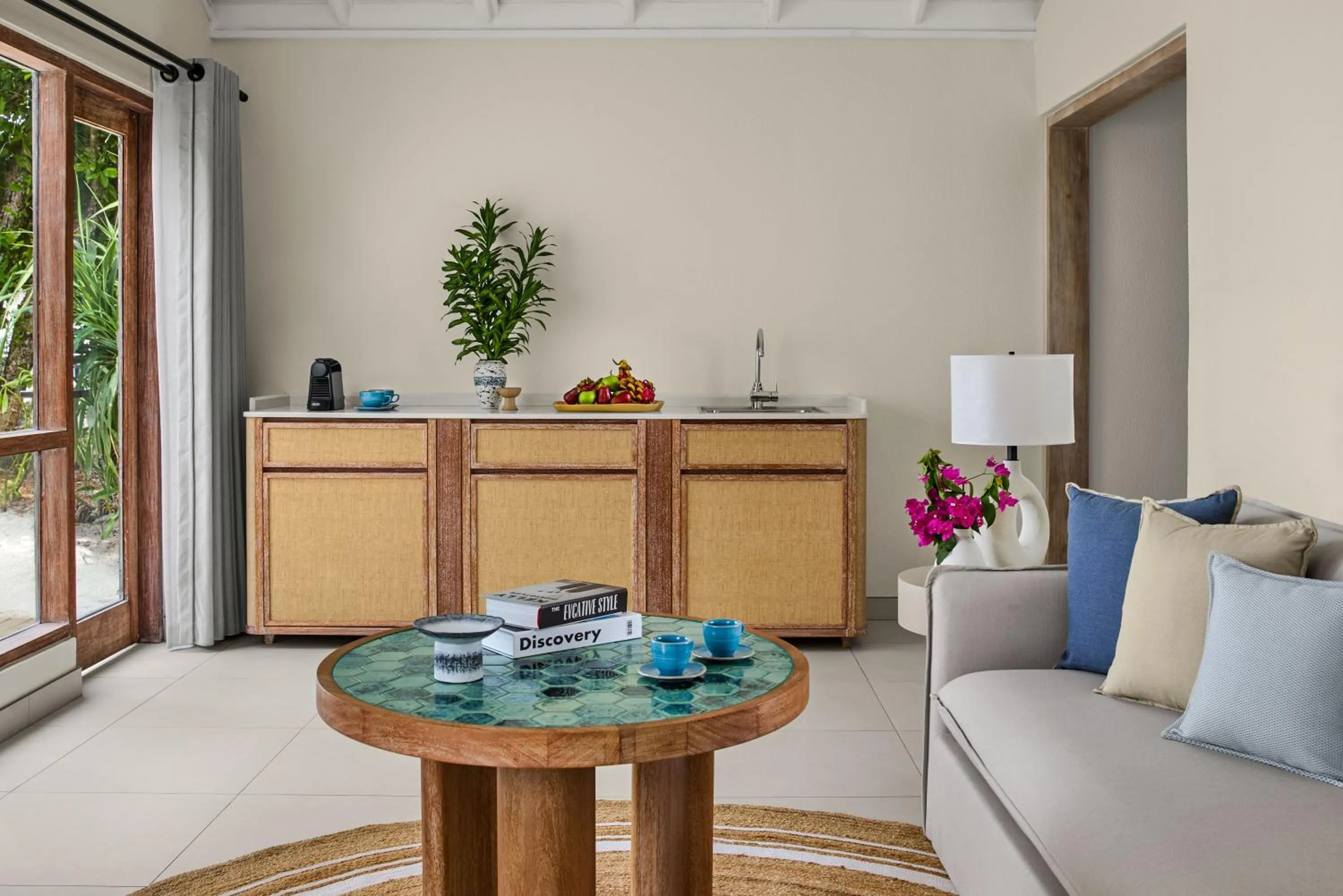 Living room in NH Collection Maldives Reethi Resort