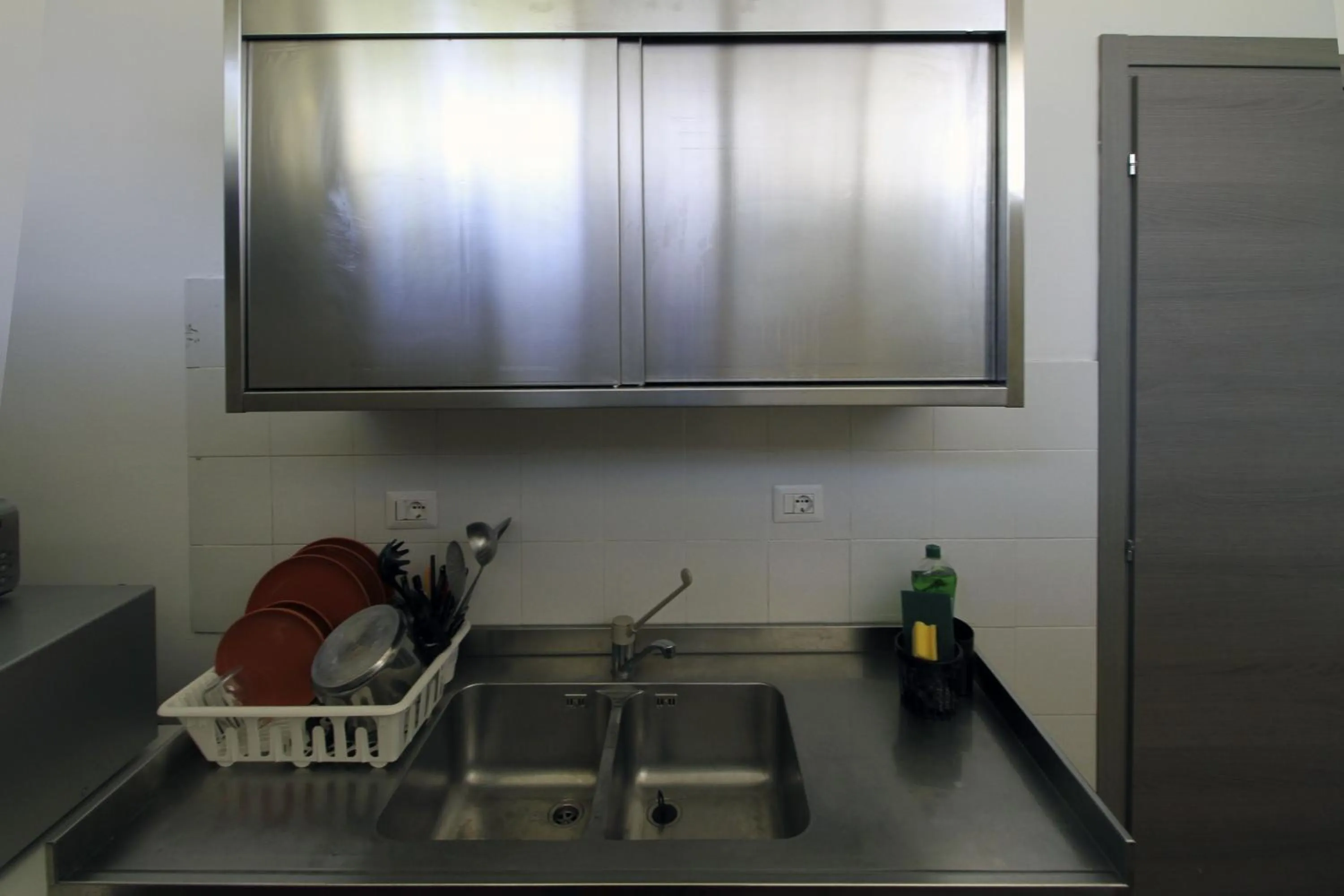 Kitchen or kitchenette in La Cordata Accommodation - Woodhouse Bike Hotel