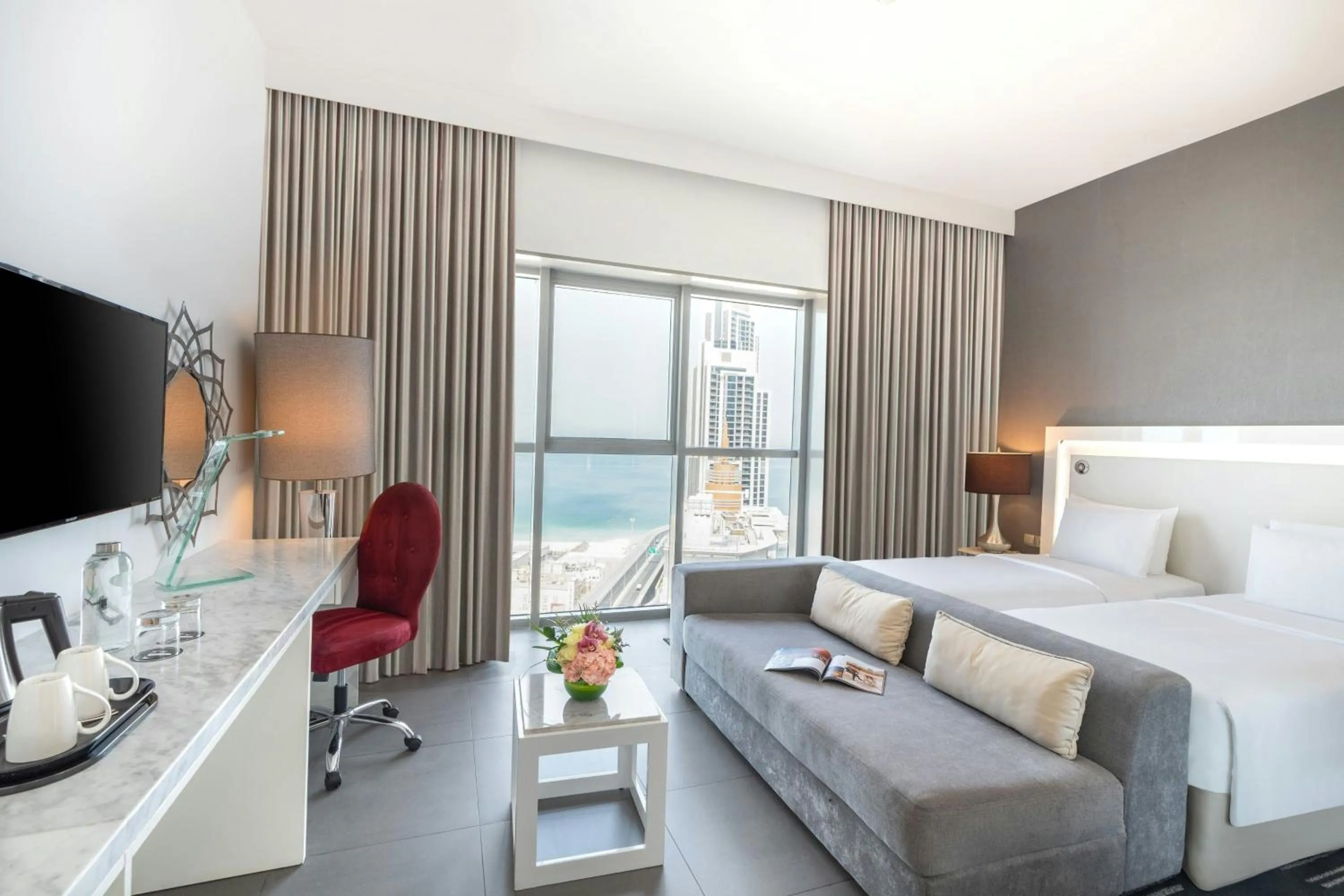 Photo of the whole room, Bed in The First Collection Marina, Dubai, a Tribute Portfolio Hotel