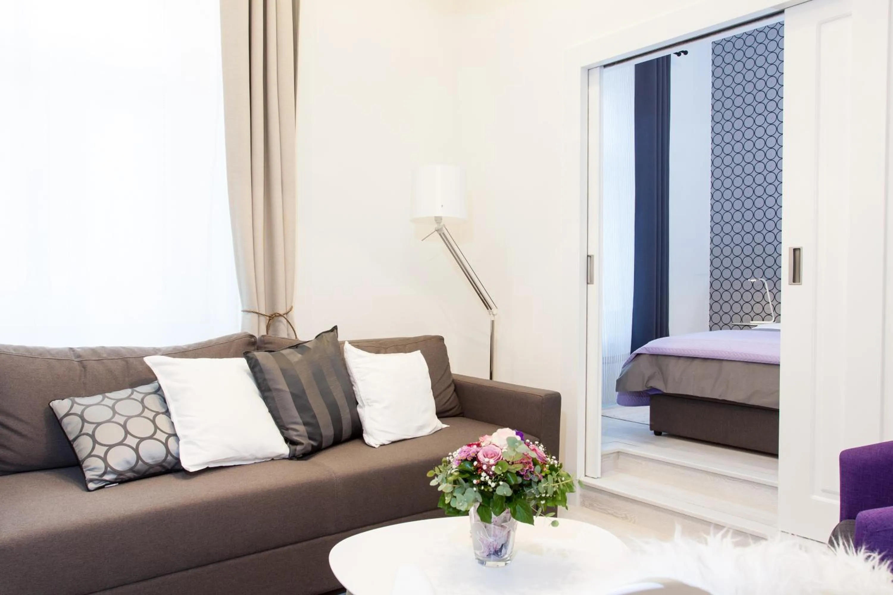 Living room, Bed in Tesla Boutique Apartments & Rooms