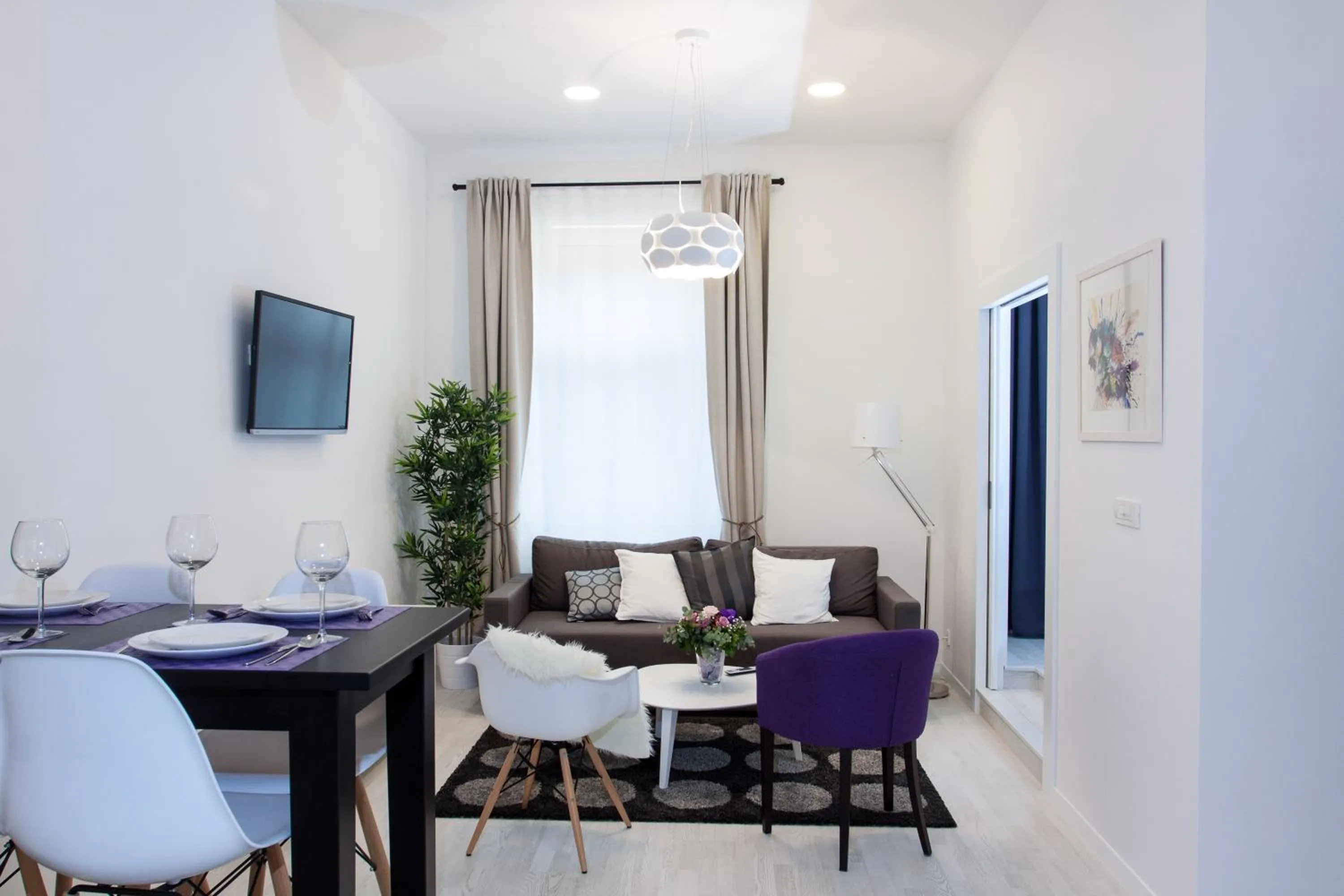 TV and multimedia in Tesla Boutique Apartments & Rooms