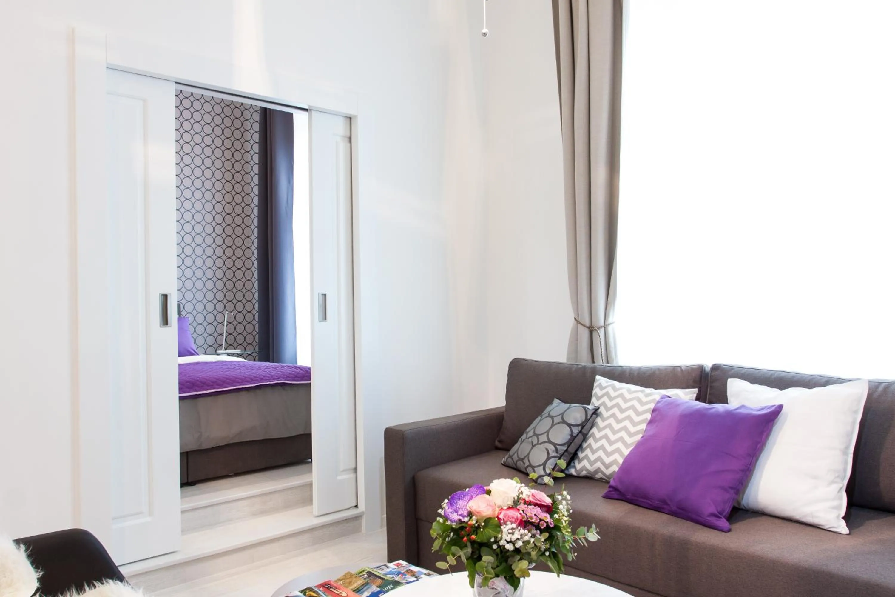 Living room, Bed in Tesla Boutique Apartments & Rooms