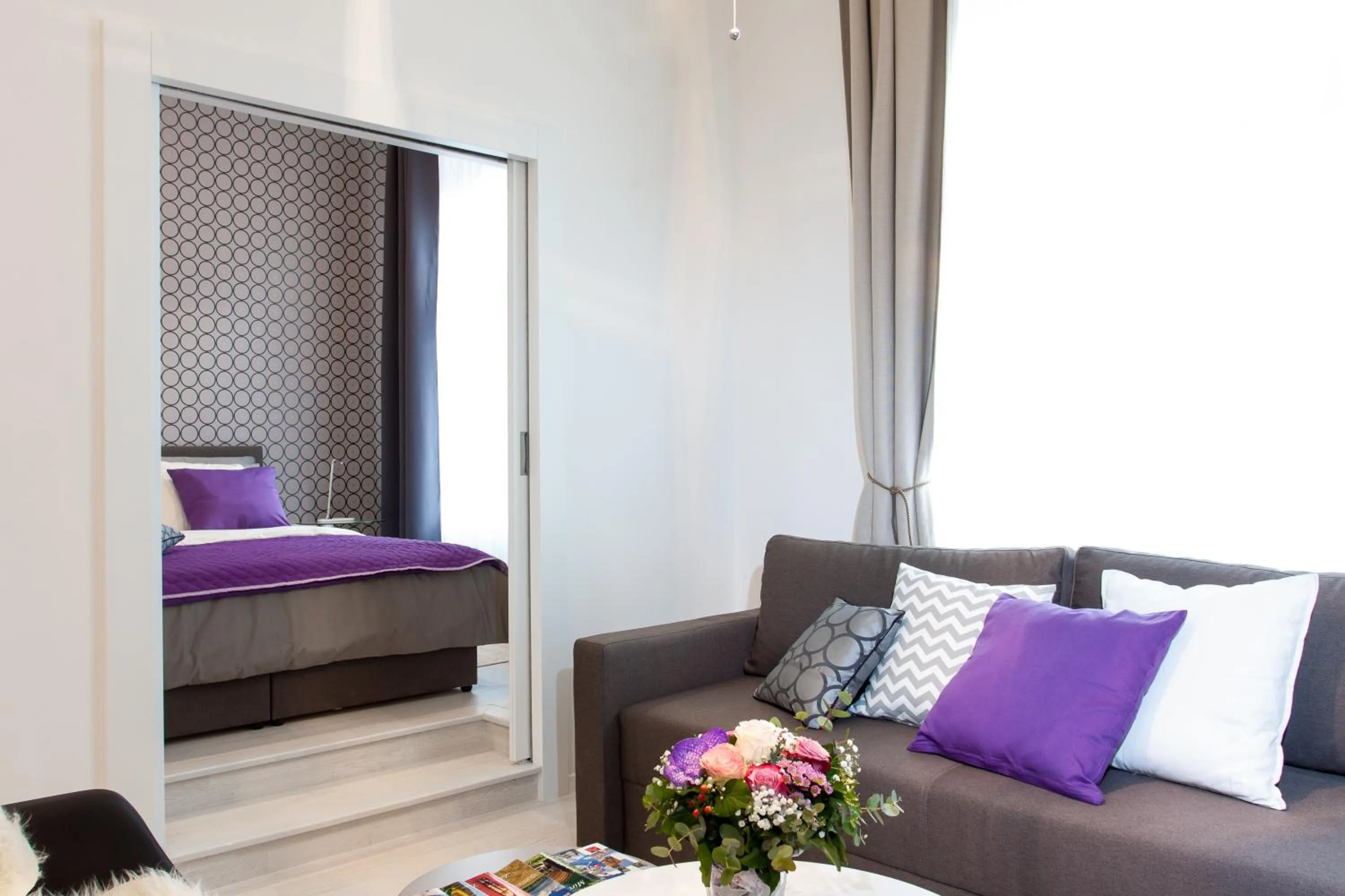 Living room, Bed in Tesla Boutique Apartments & Rooms