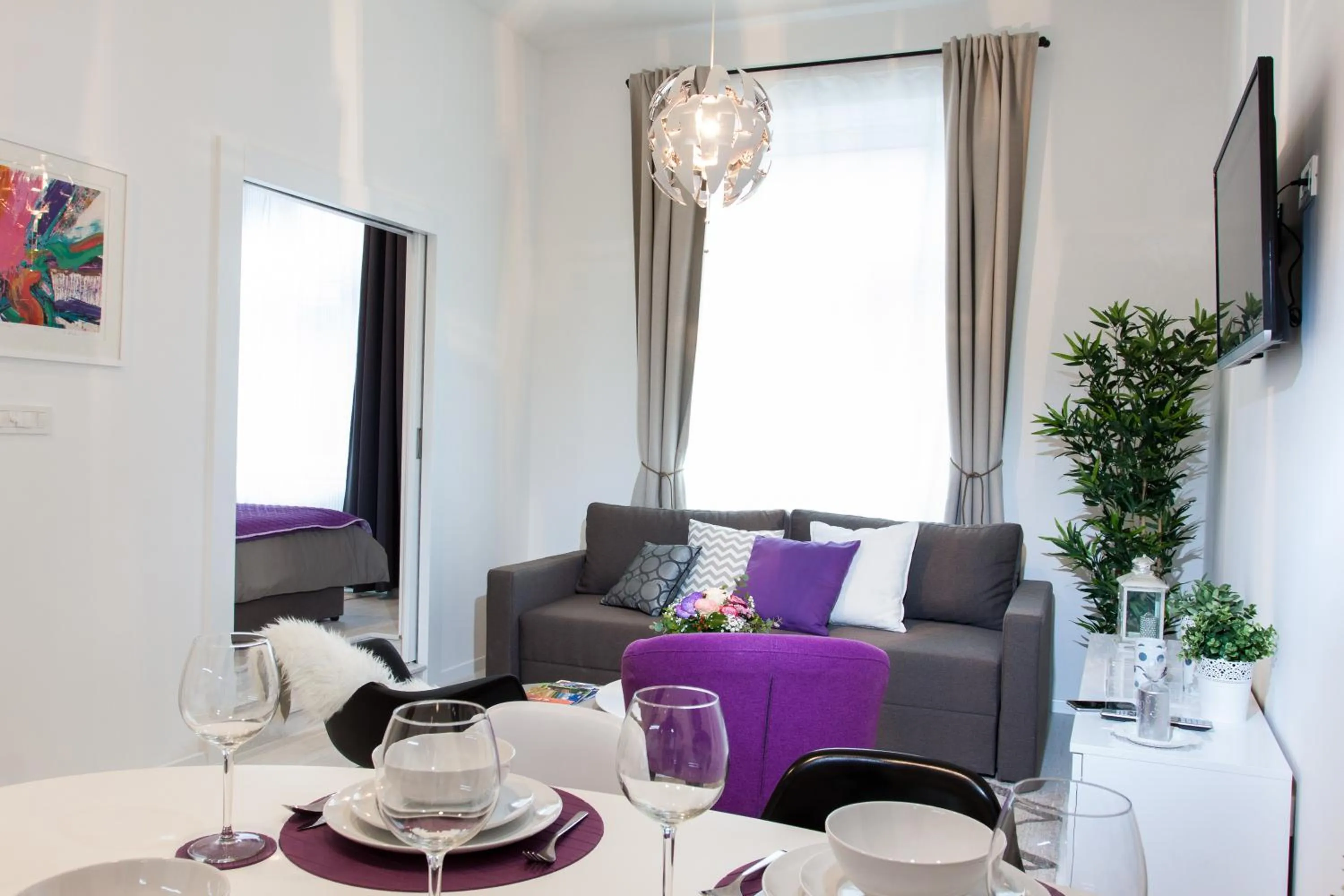 TV and multimedia in Tesla Boutique Apartments & Rooms