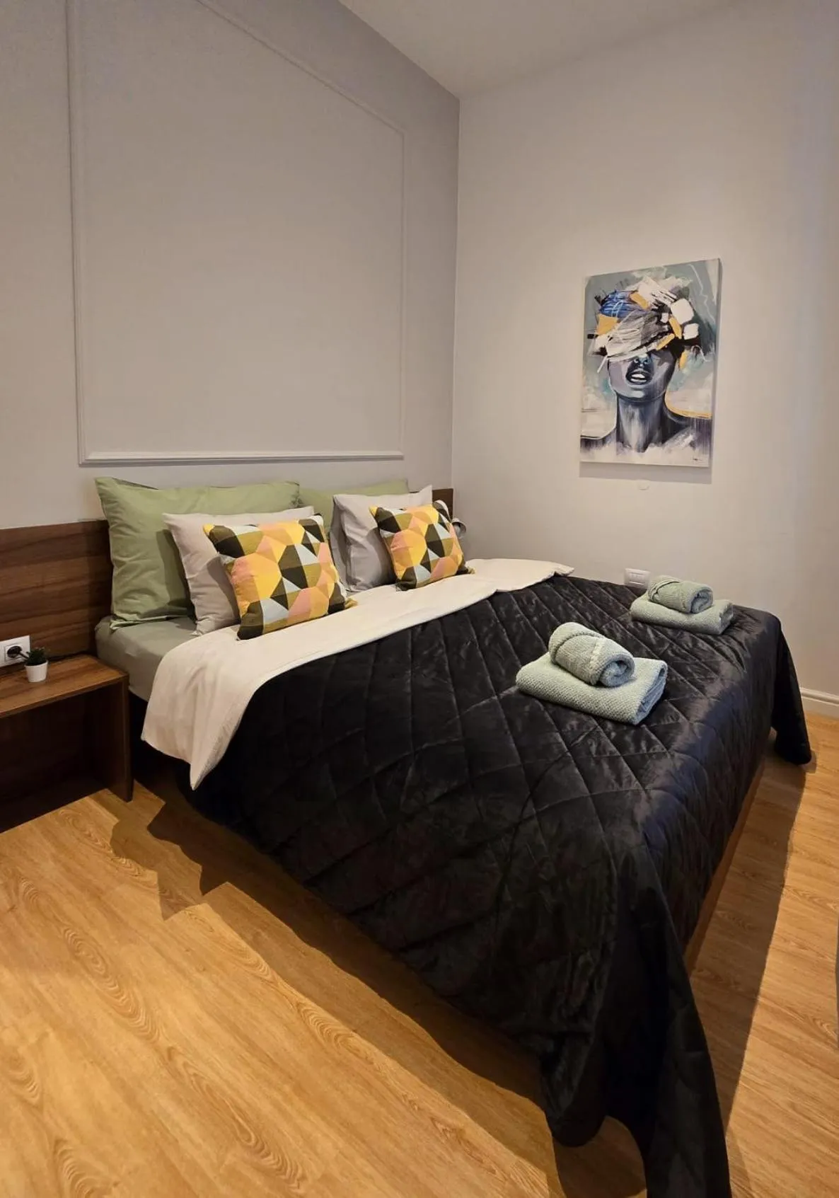 Bed in Tesla Boutique Apartments & Rooms
