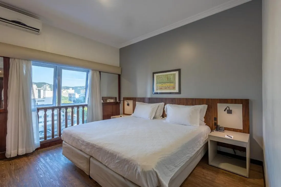 Bed in Plaza Blumenau Hotel