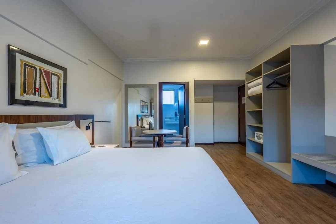 Bed in Plaza Blumenau Hotel