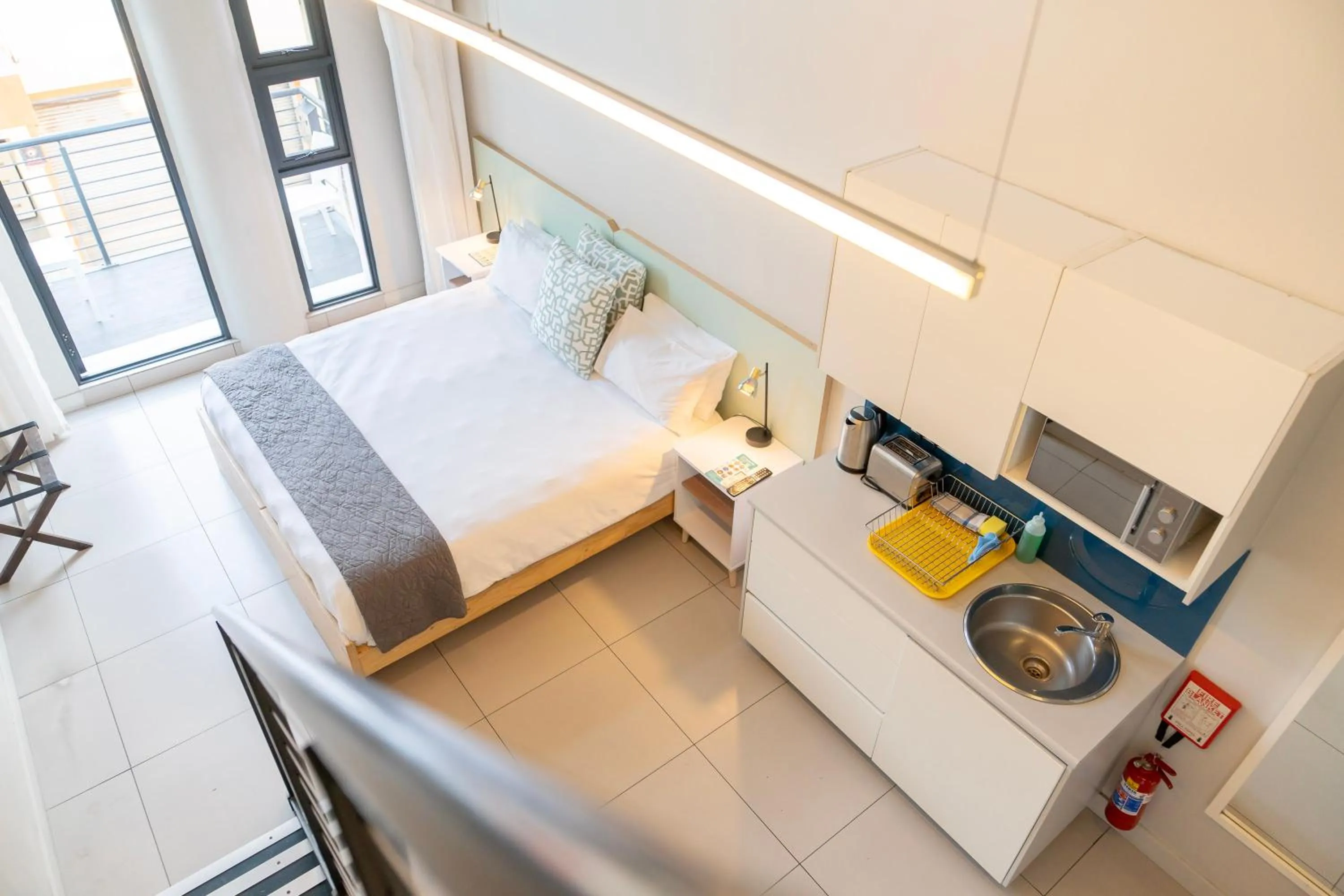 Photo of the whole room, Bed in Mojo Hotel & Market