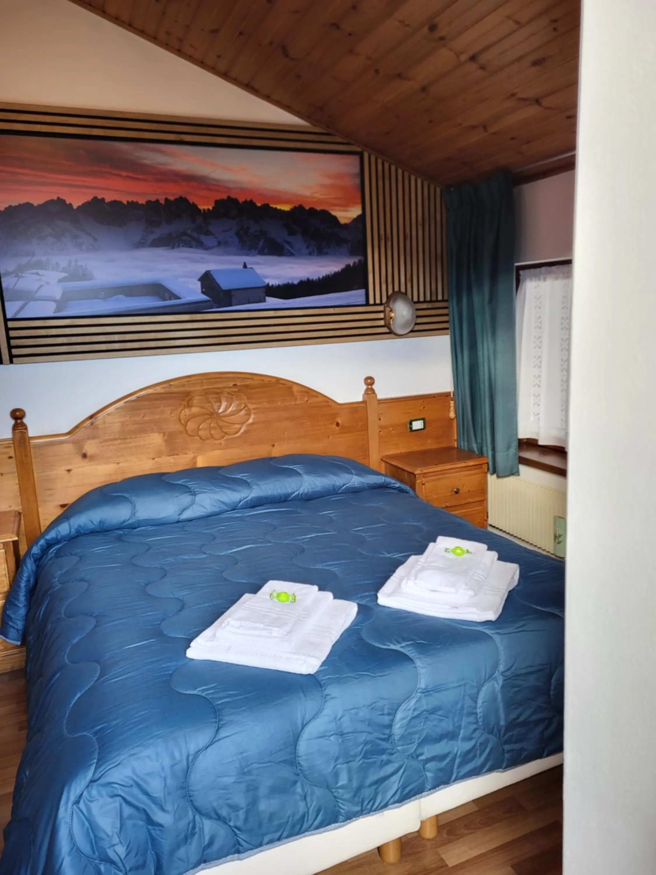 Bed in Albergo Meuble Tarandan