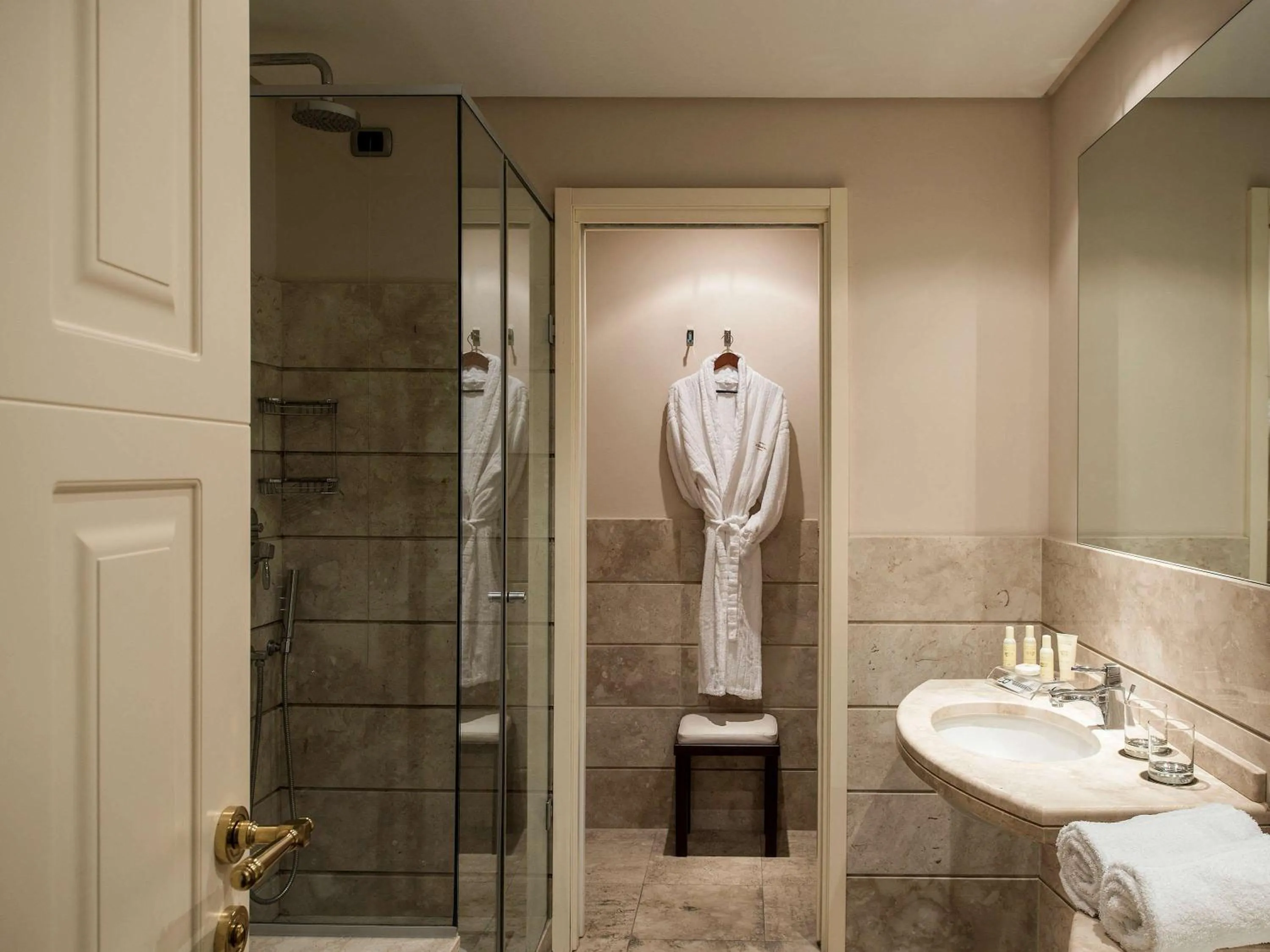 Photo of the whole room, Bathroom in Grand Hotel Palazzo Livorno MGallery Collection