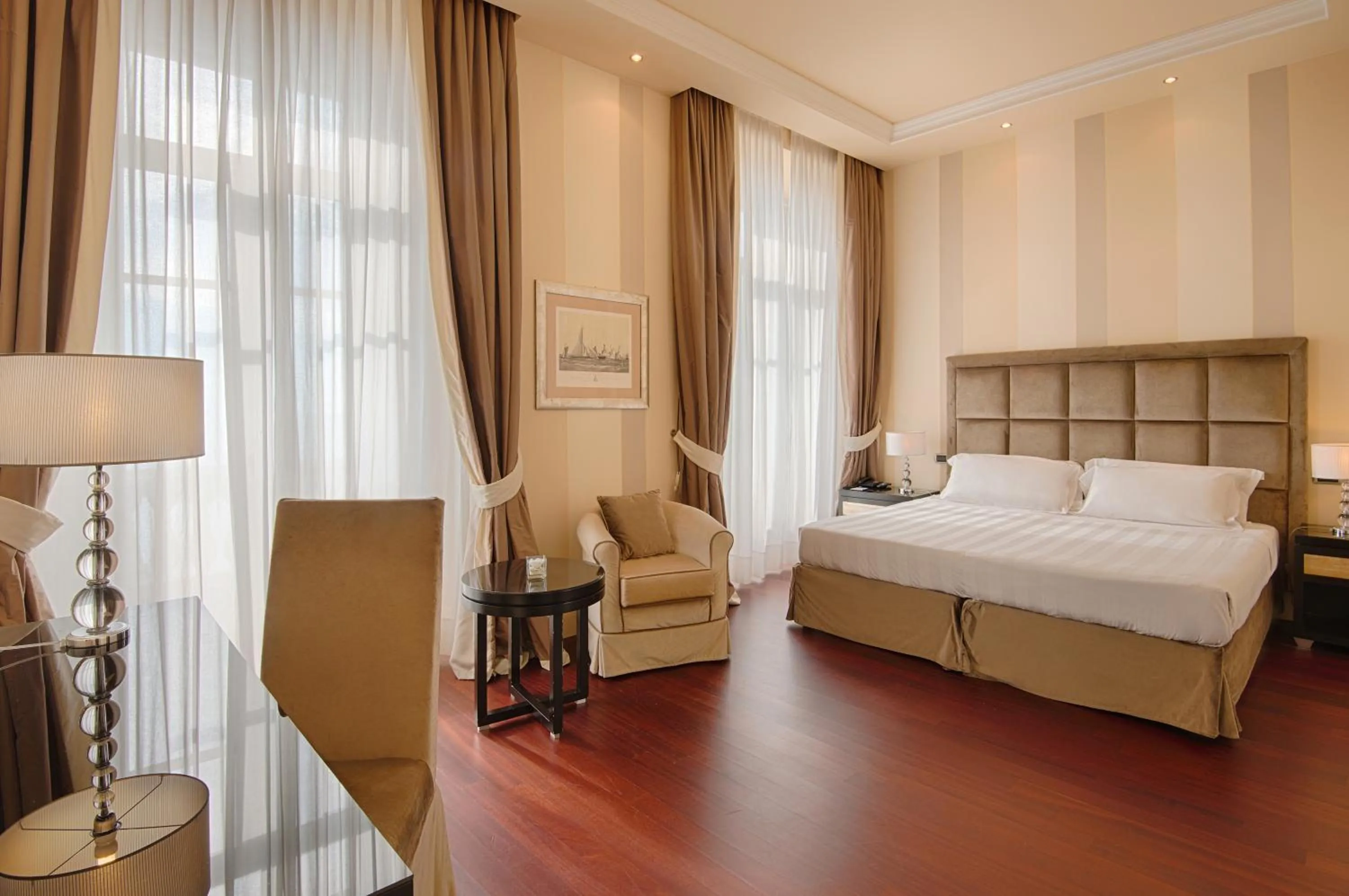 Bed in Grand Hotel Palazzo Livorno MGallery Collection