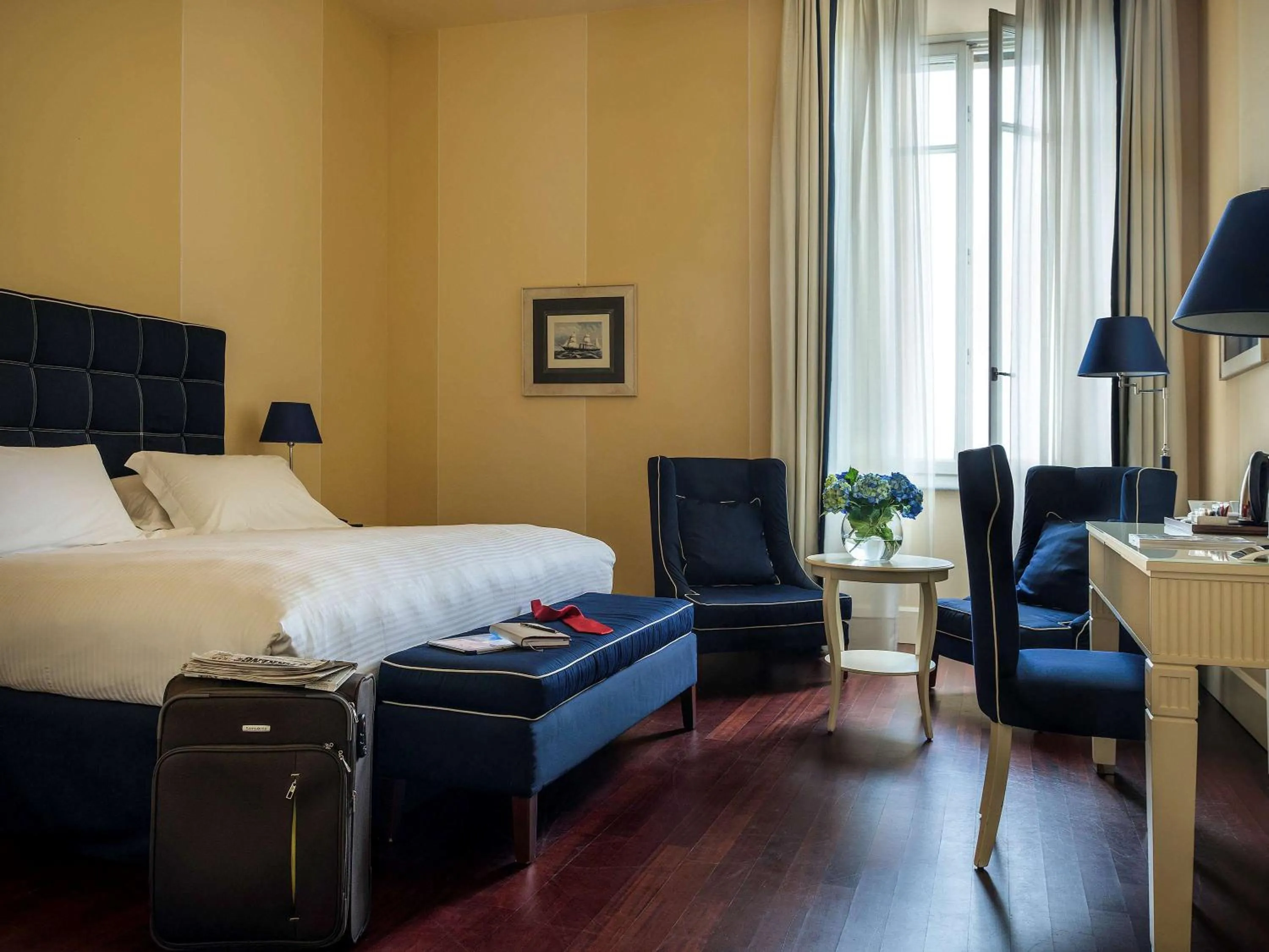 Photo of the whole room, Bed in Grand Hotel Palazzo Livorno MGallery Collection