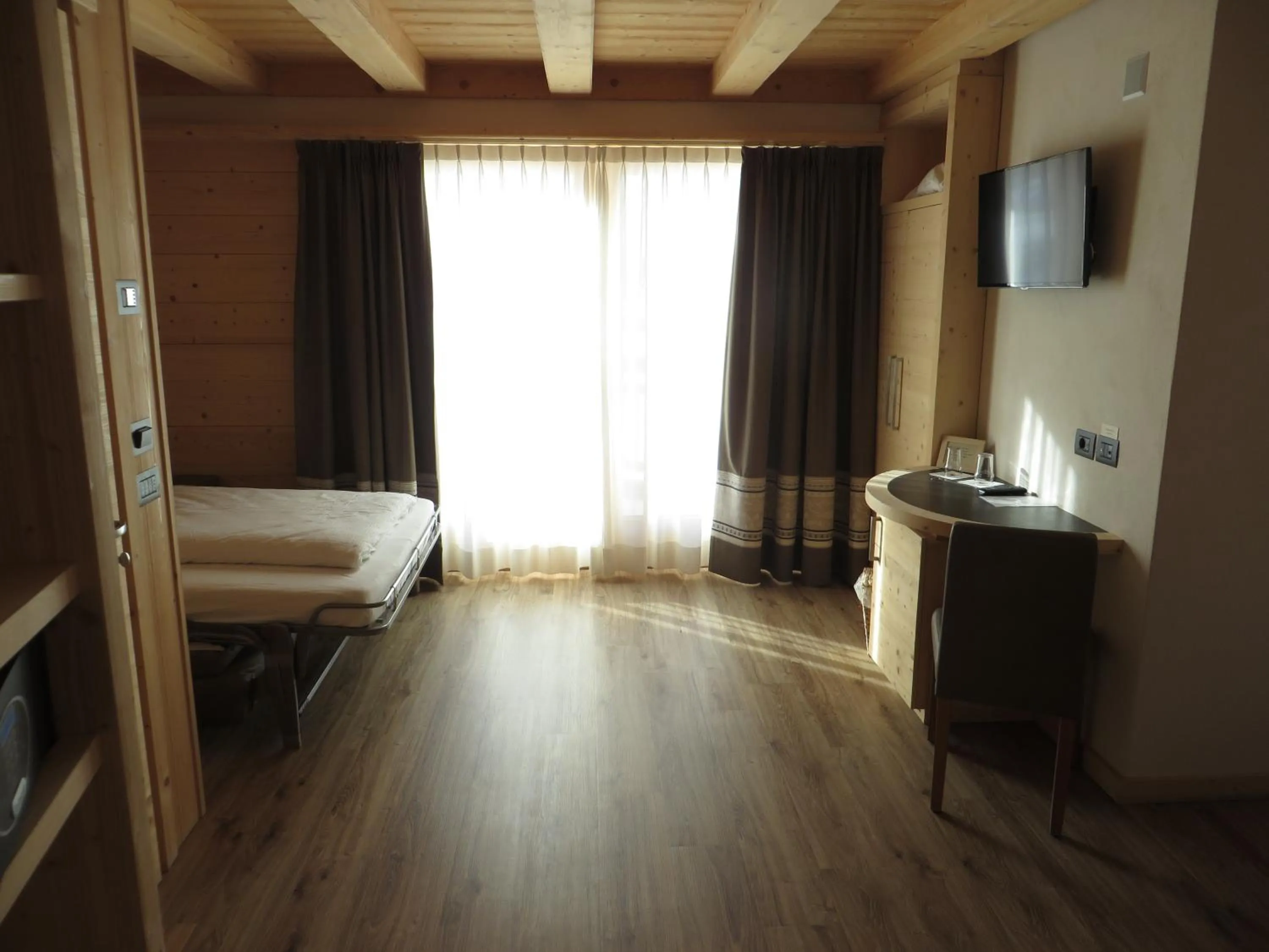 Bed in B&B Ecohotel Chalet des Alpes