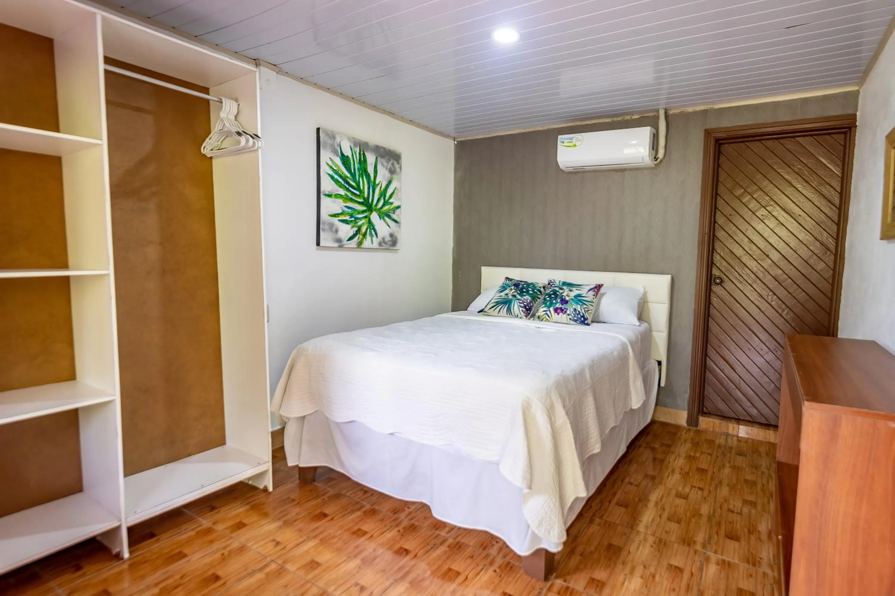 Bed in Hotel Tortuguero Beachfront
