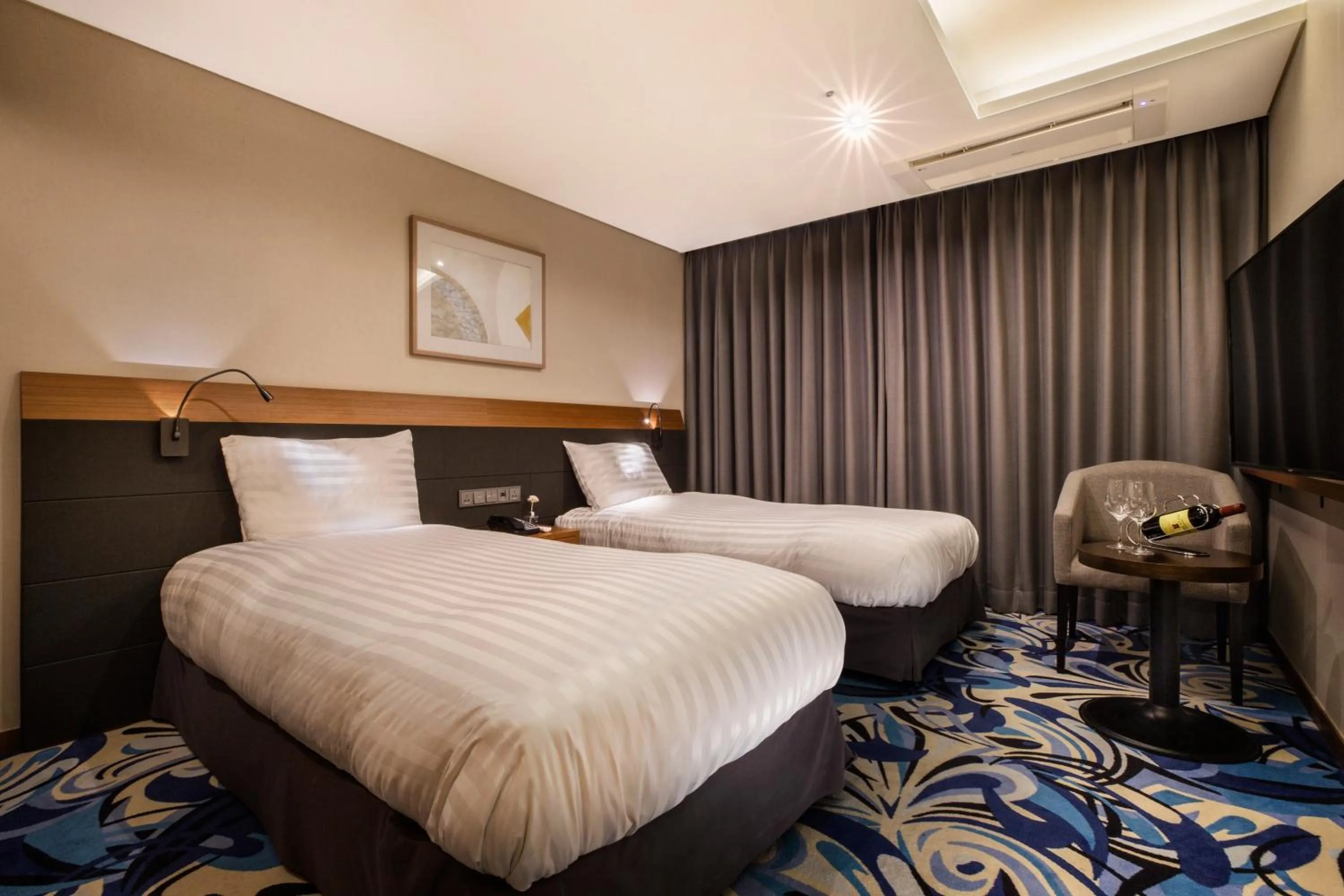 Bed in Shin Shin Hotel Jeju Airport