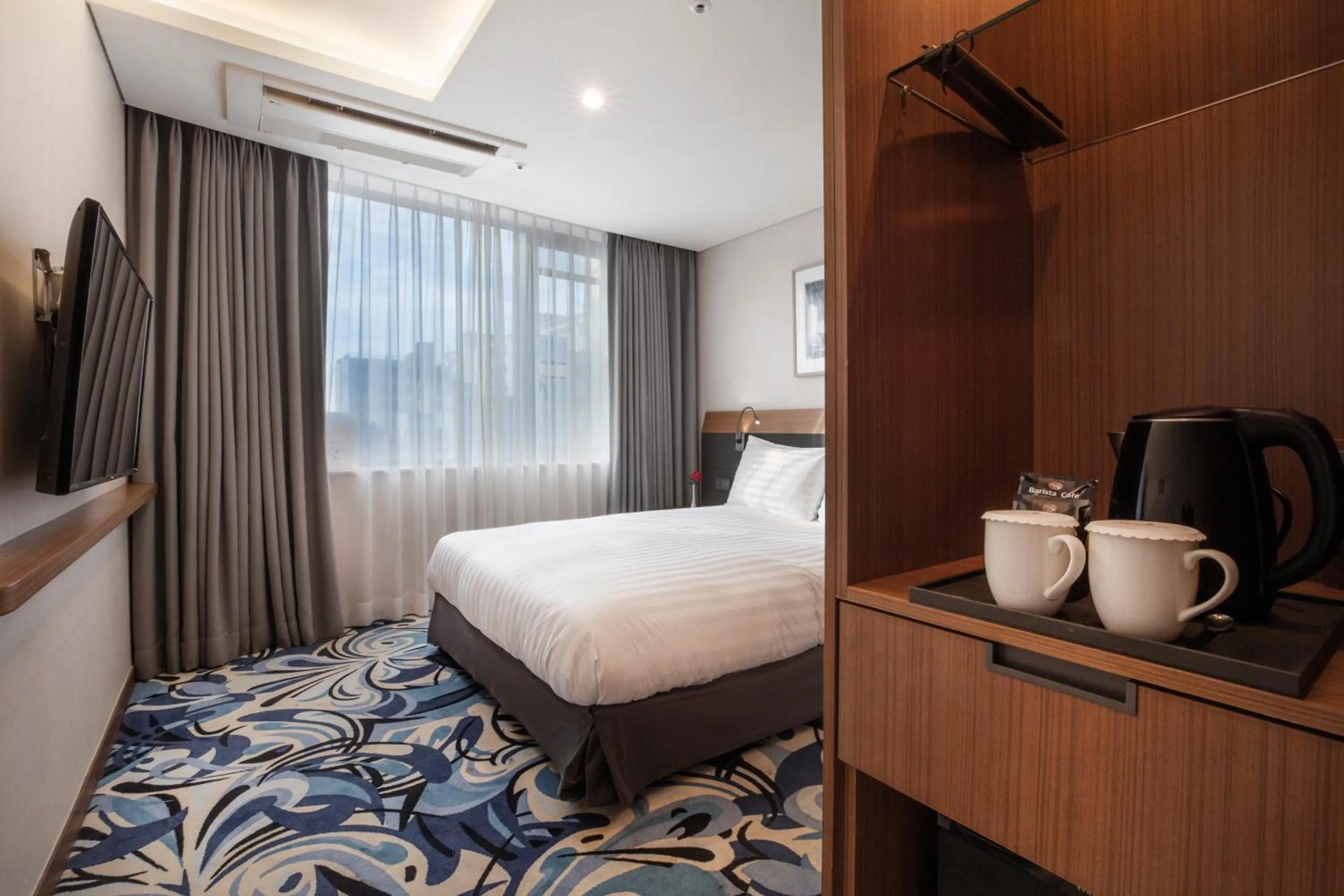 Bed in Shin Shin Hotel Jeju Airport