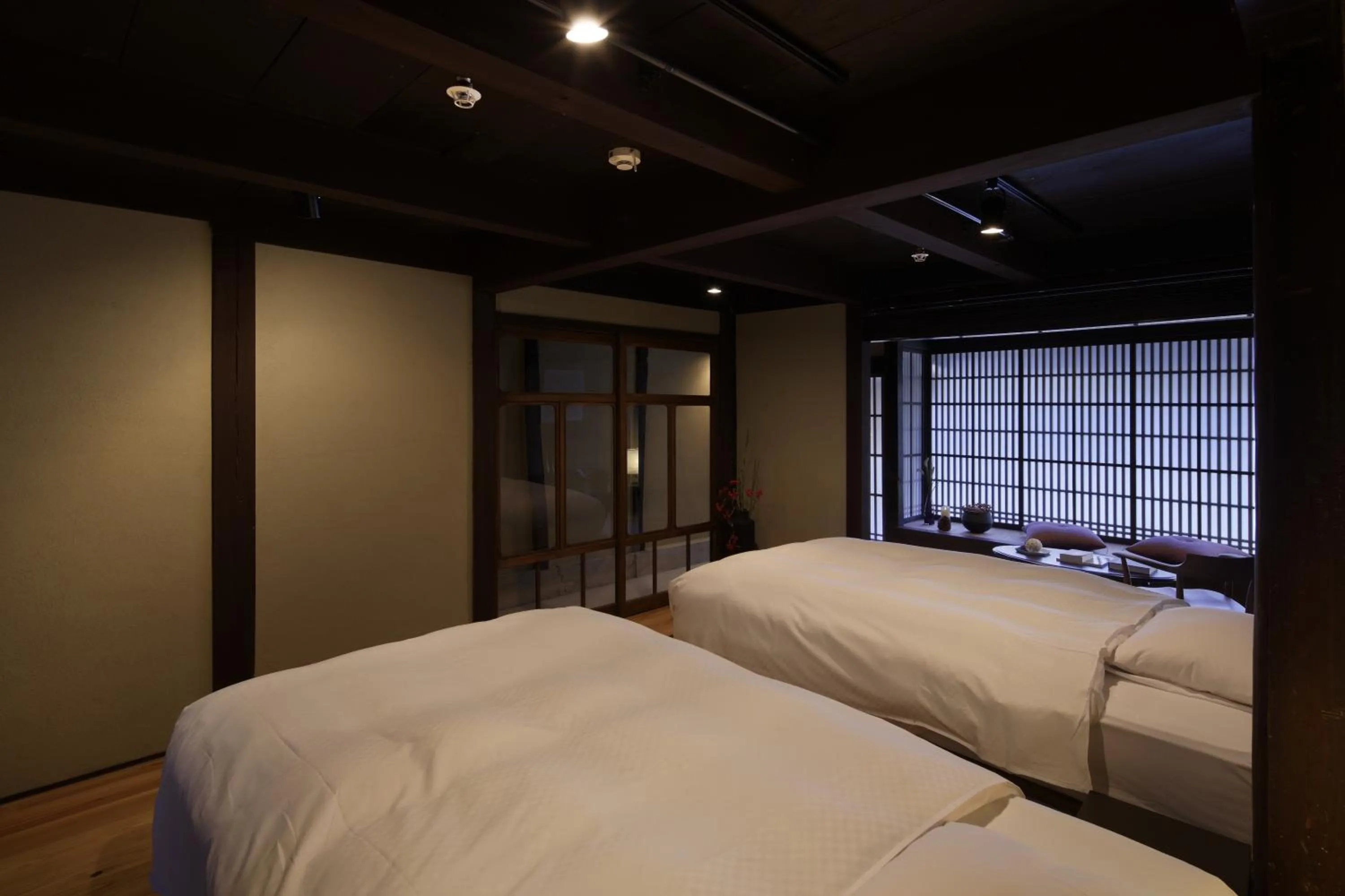 Bed in NIPPONIA Sasayama Castle Town Hotel