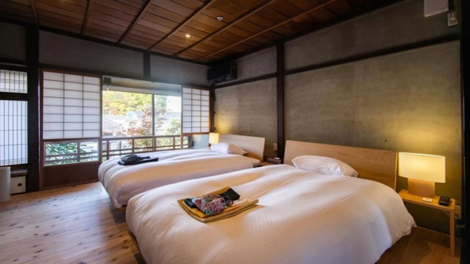 Bed in NIPPONIA Sasayama Castle Town Hotel
