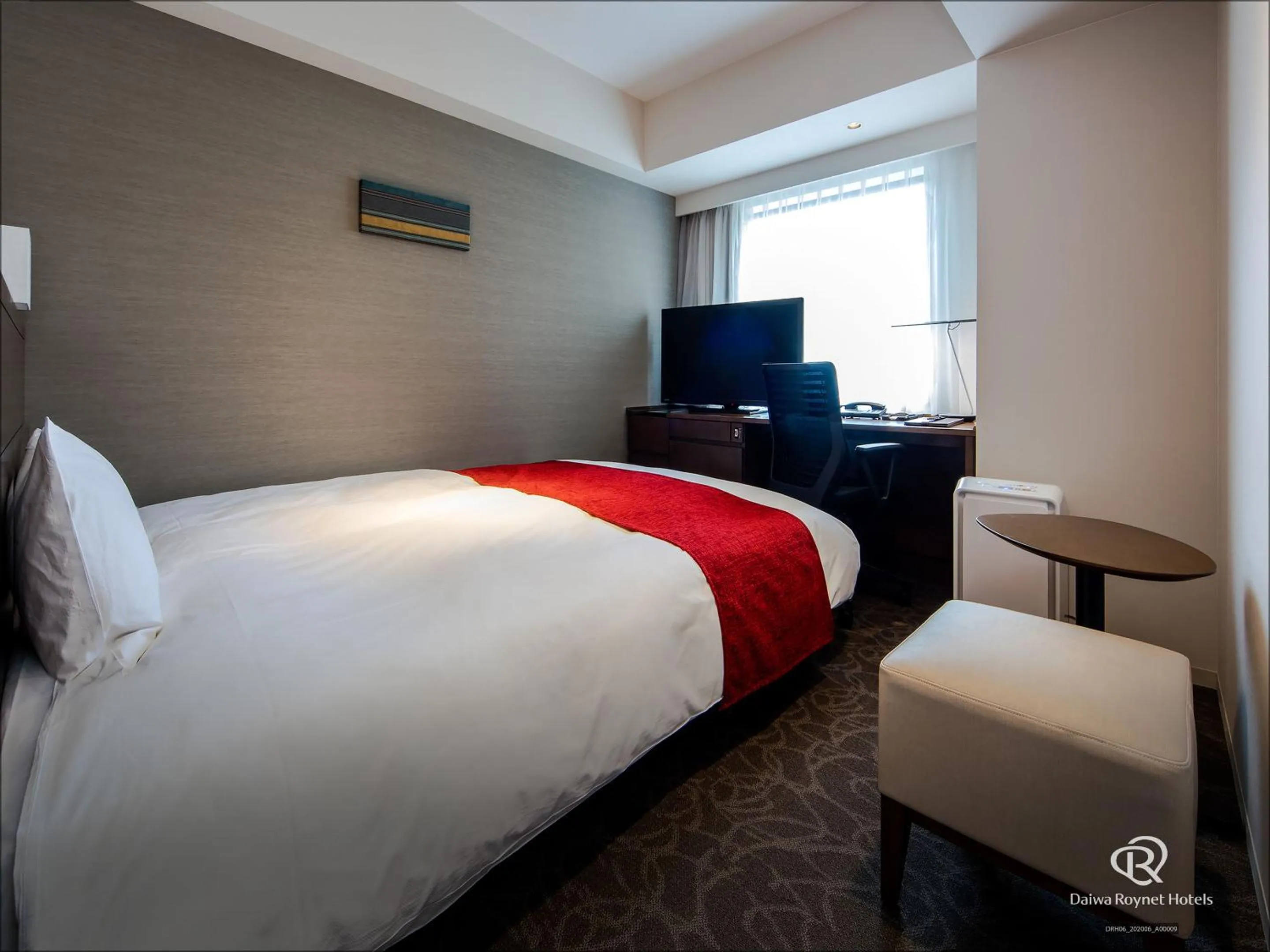 Photo of the whole room, Bed in Daiwa Roynet Hotel Matsuyama