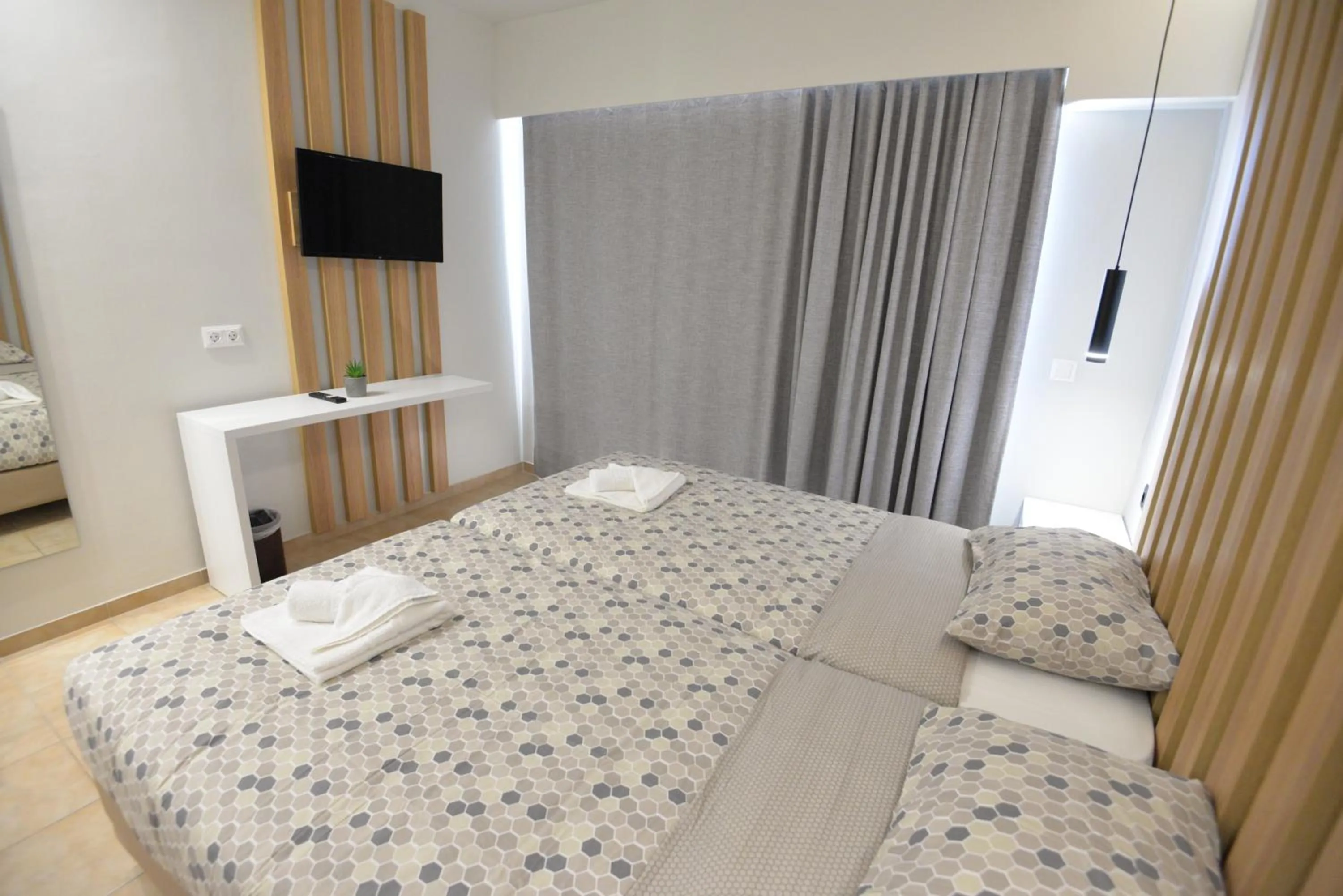 Bed in Heleni Beach Hotel