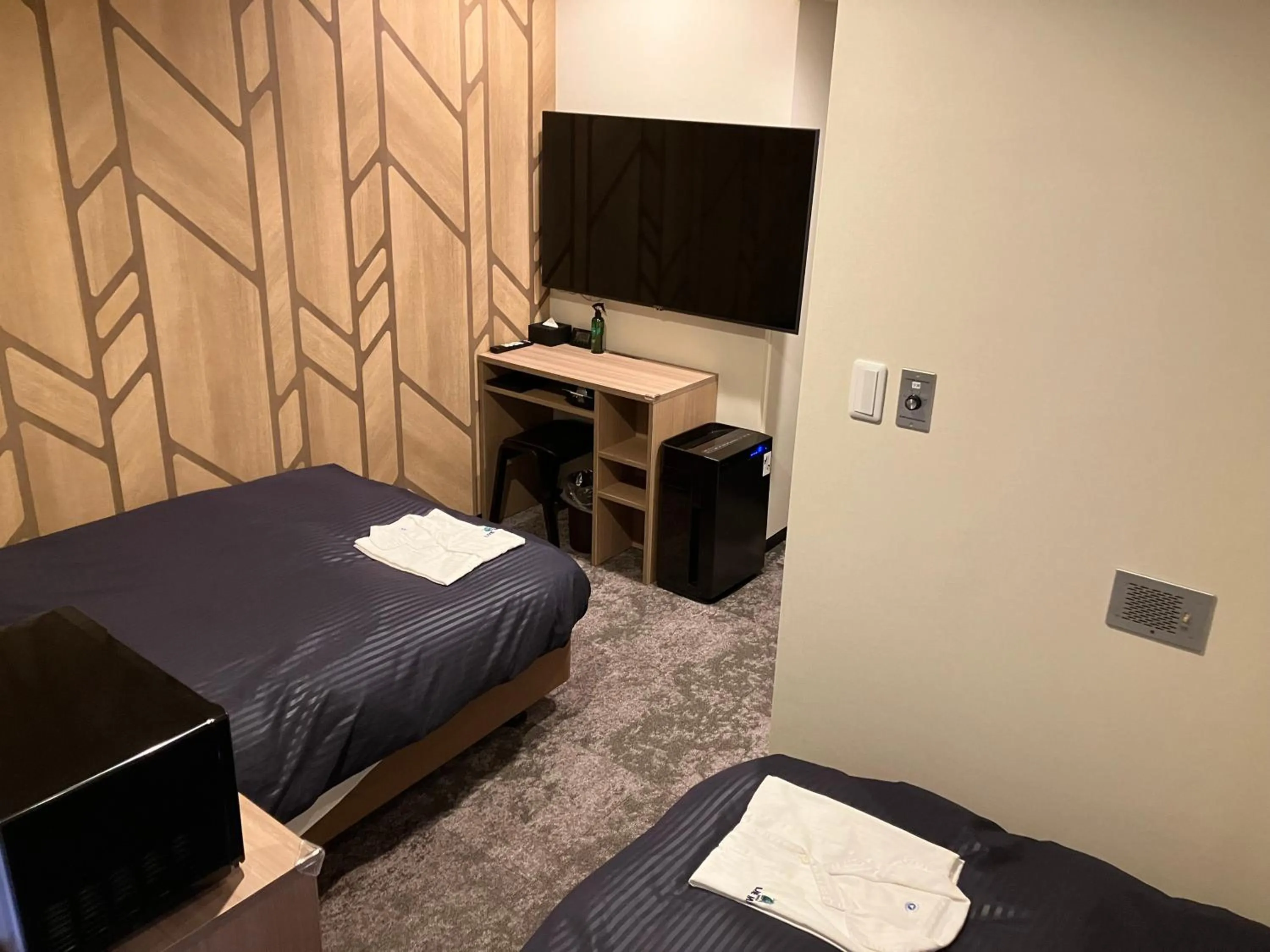 Bed in HOTEL LiVEMAX Mihara Ekimae