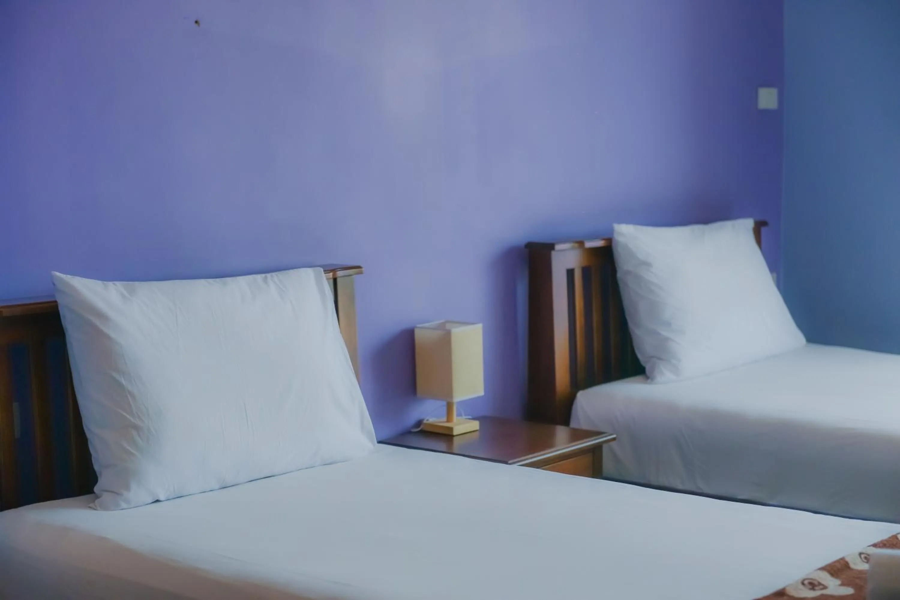 Bed in Patumnak Beach Guesthouse