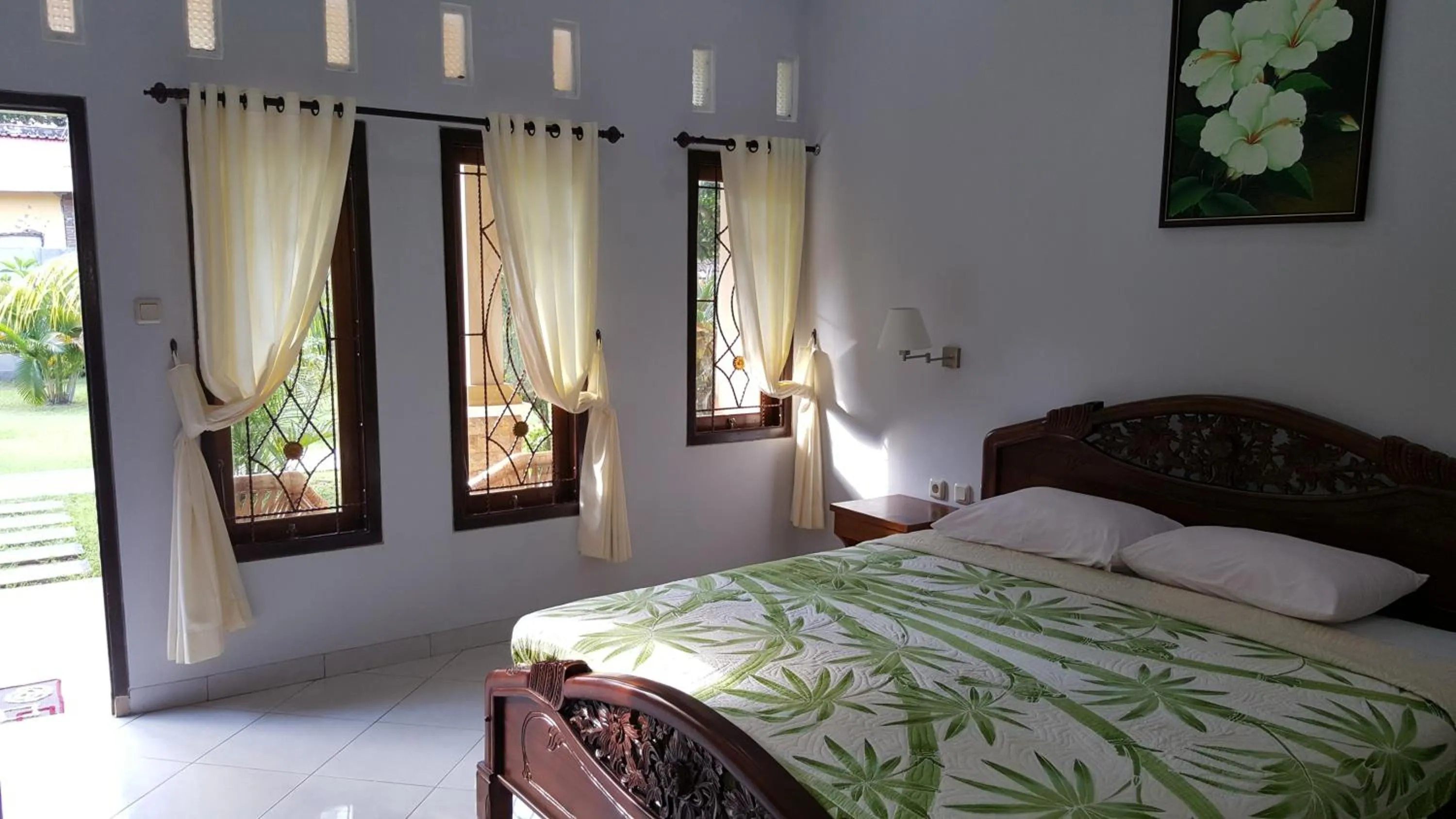 Bedroom, Bed in Sari Inn Kuta Lombok