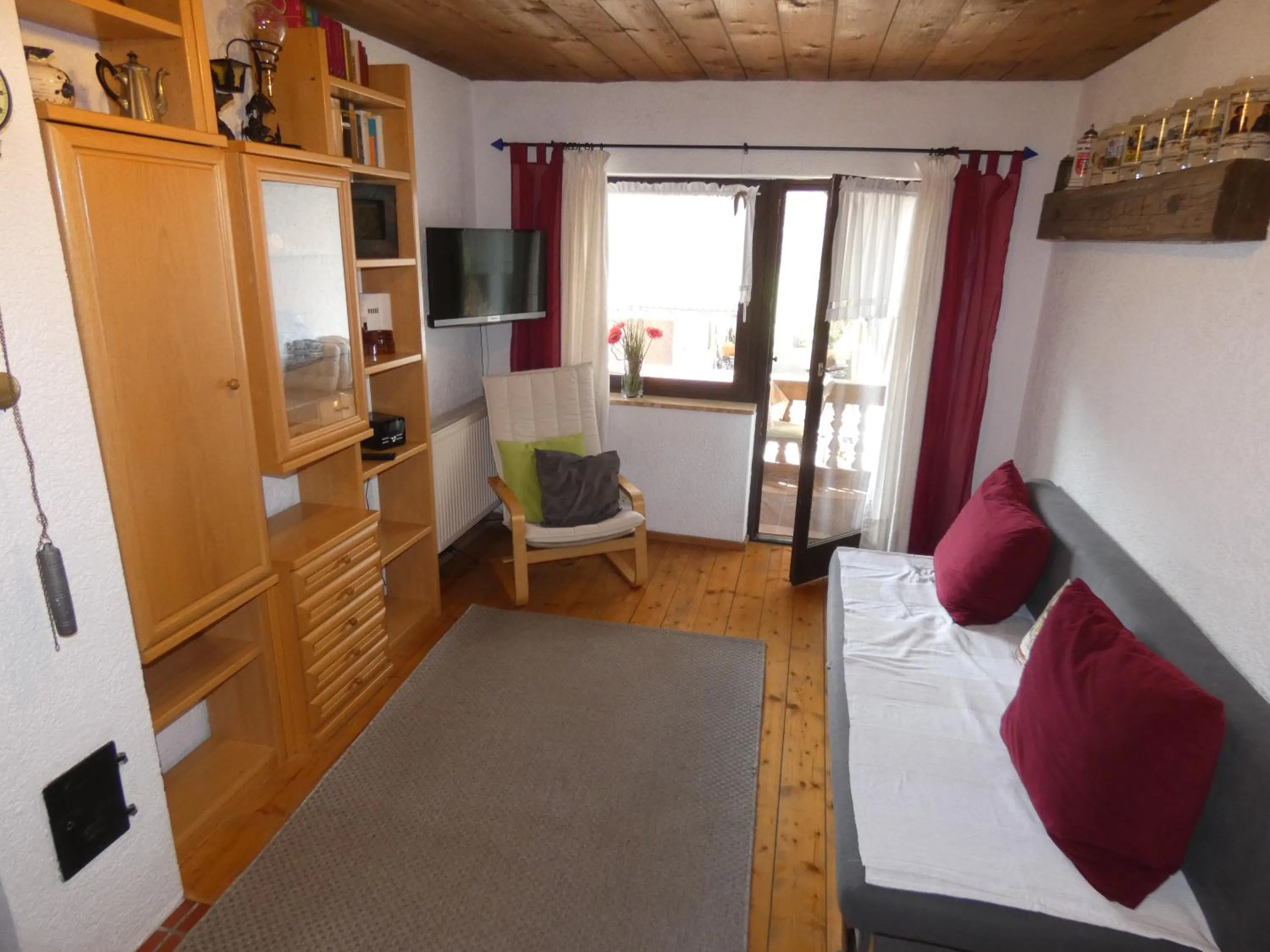 Living room, Bed in Apartments Donebauer