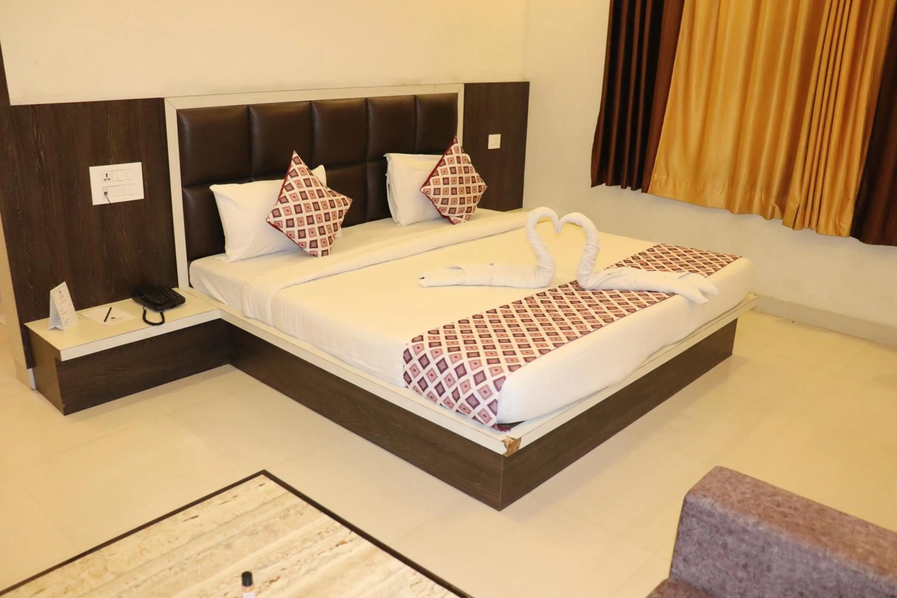 Bed in Hotel Riddhi Inn