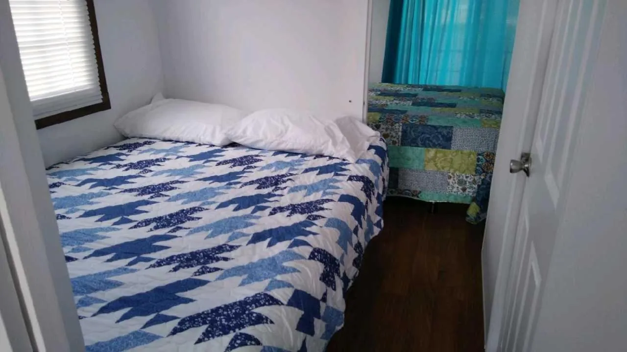 Bed in Old Wooden Bridge Resort & Marina