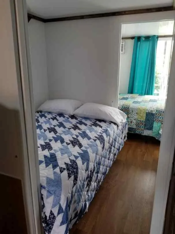 Bed in Old Wooden Bridge Resort & Marina