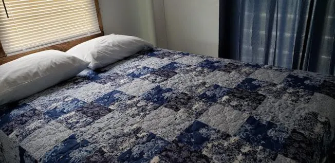 Bed in Old Wooden Bridge Resort & Marina