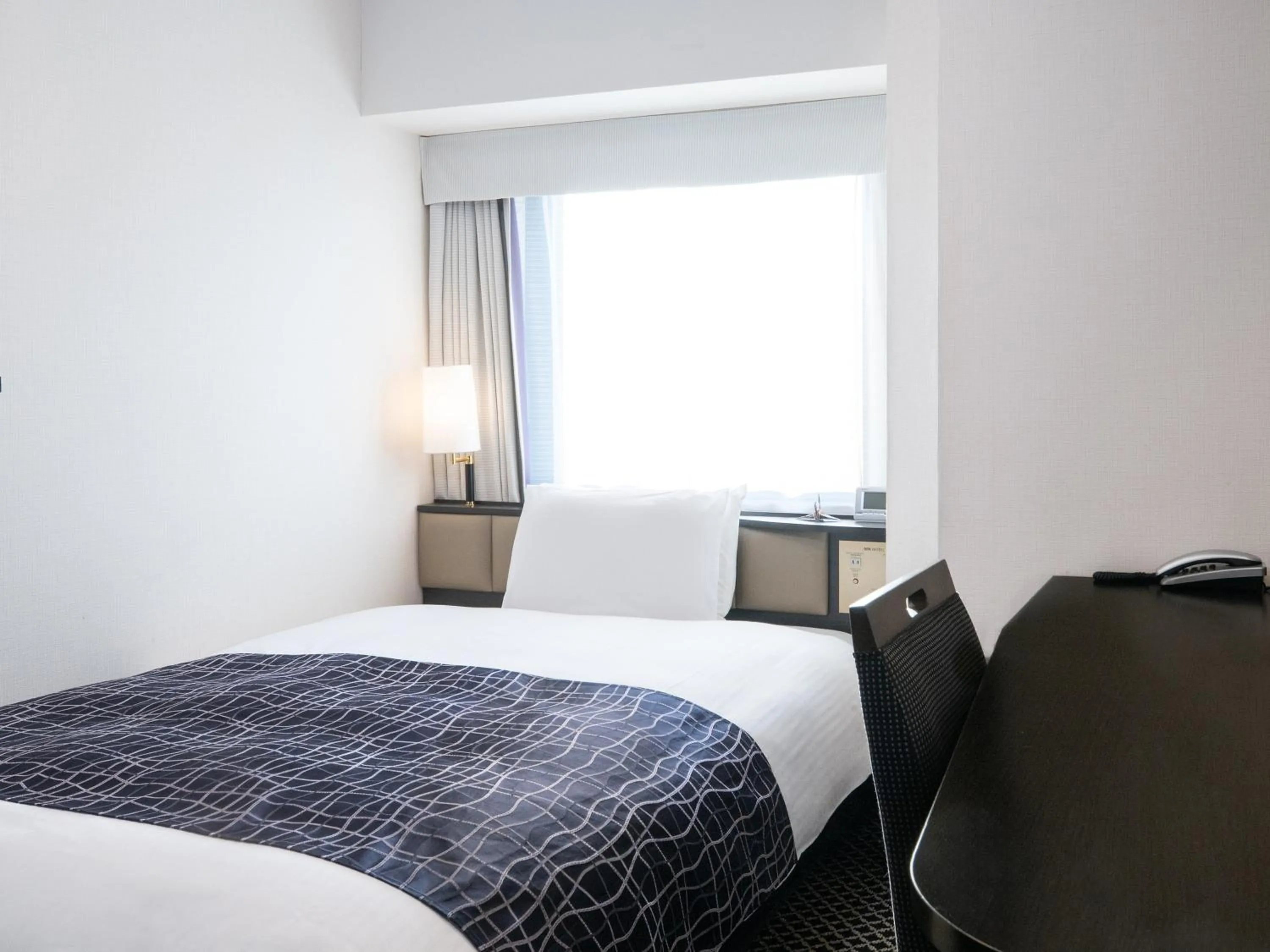 Bed in APA Hotel Keisei Ueno Ekimae