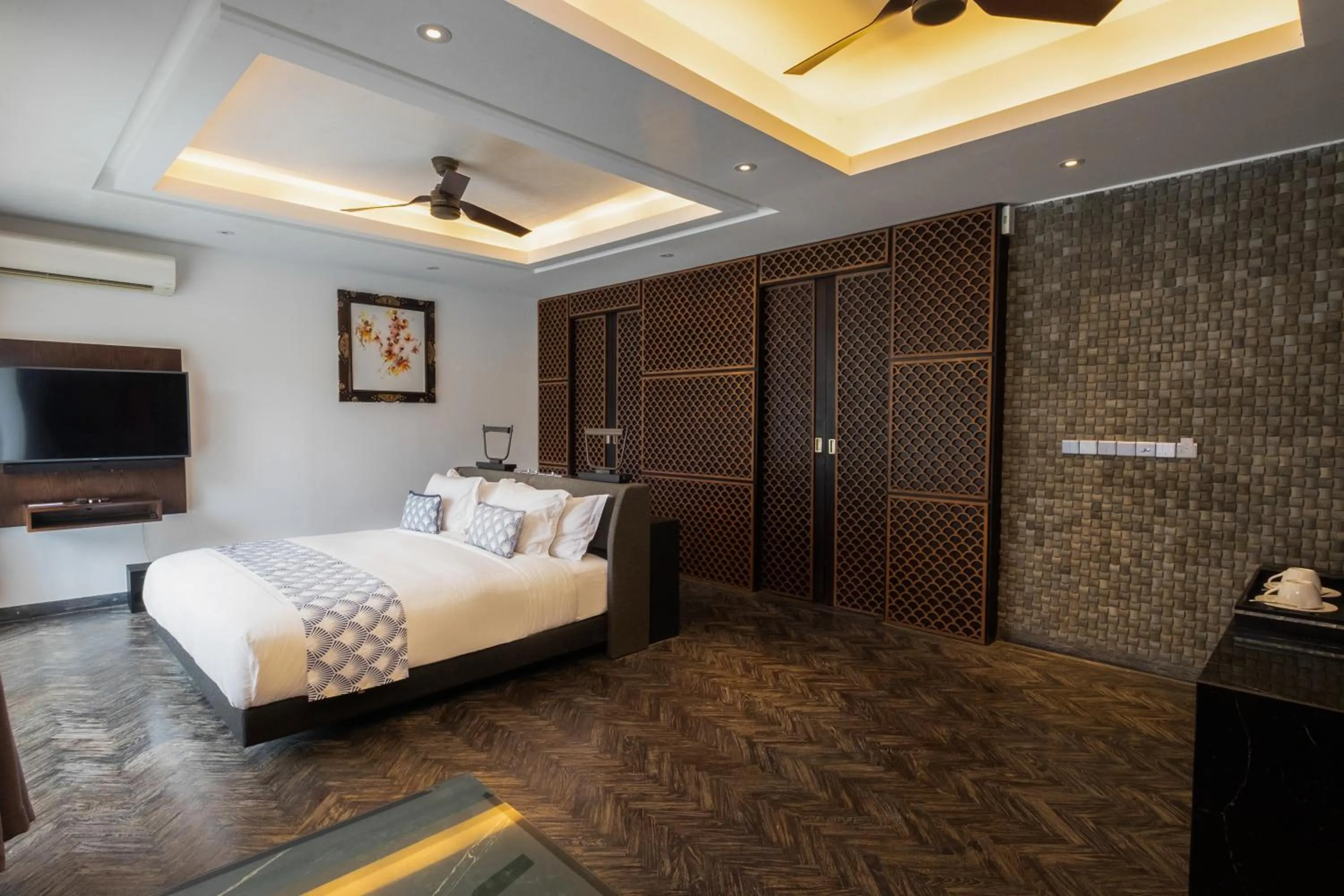 Bed in Prasana Villas by Arjani Resorts