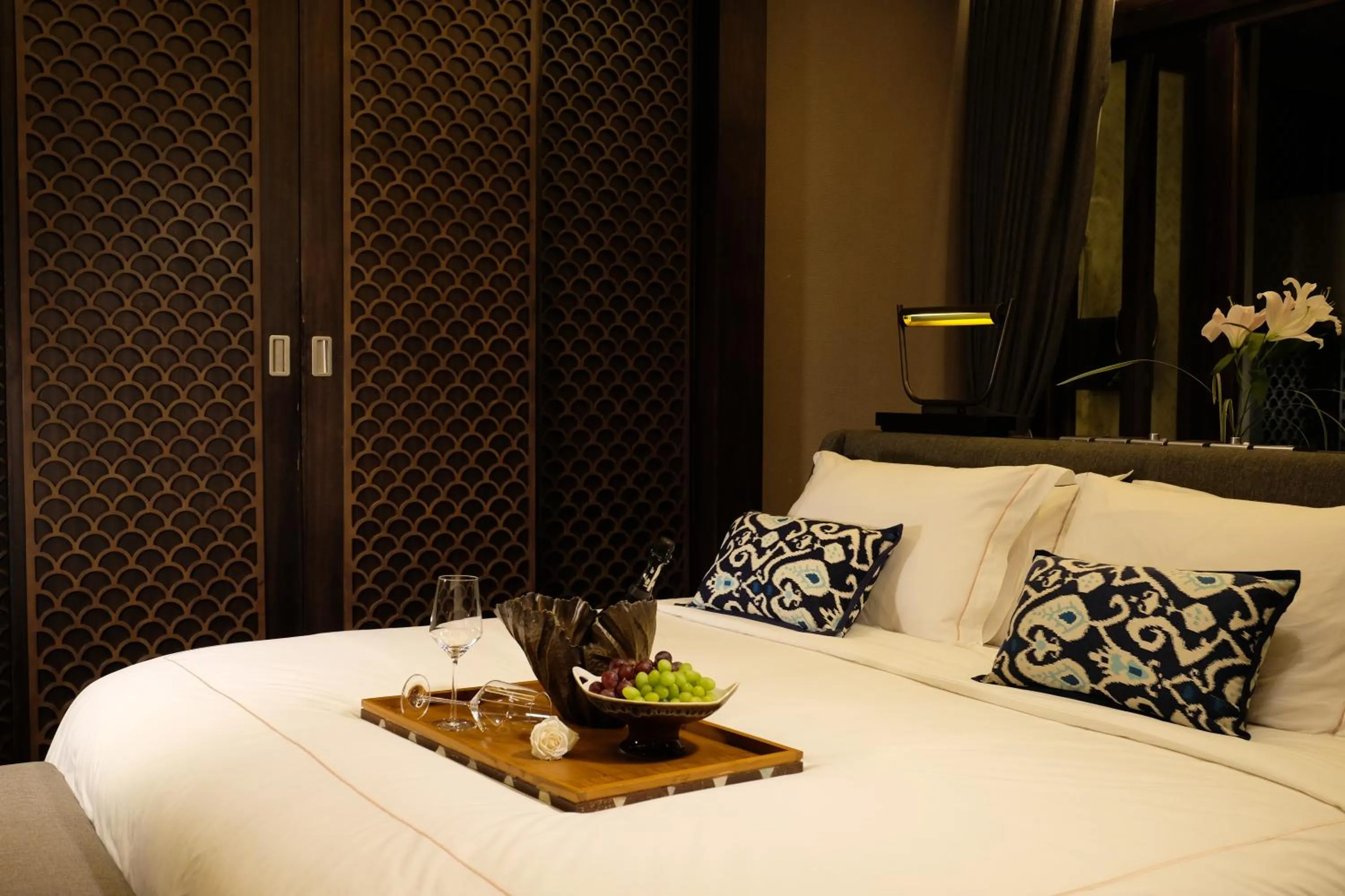 Bed in Prasana Villas by Arjani Resorts