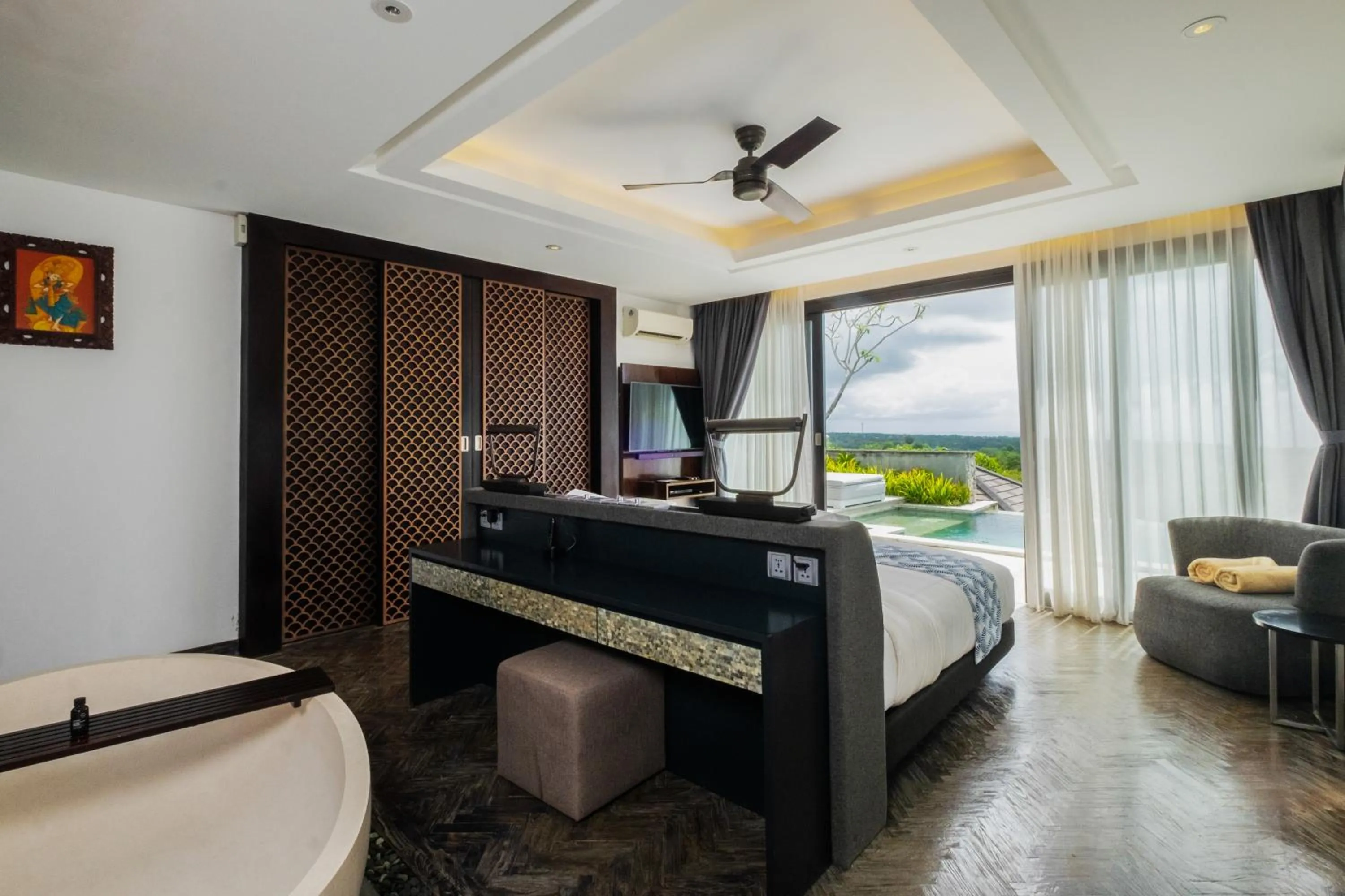 Bed in Prasana Villas by Arjani Resorts