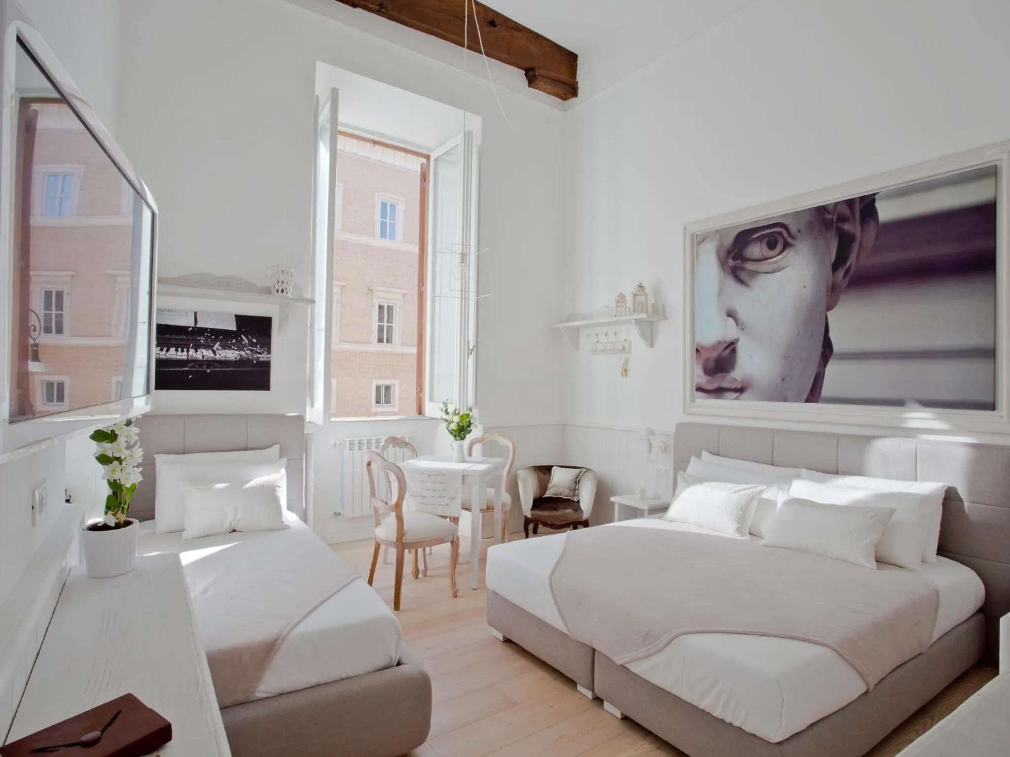 Photo of the whole room in Primo Piano Suites