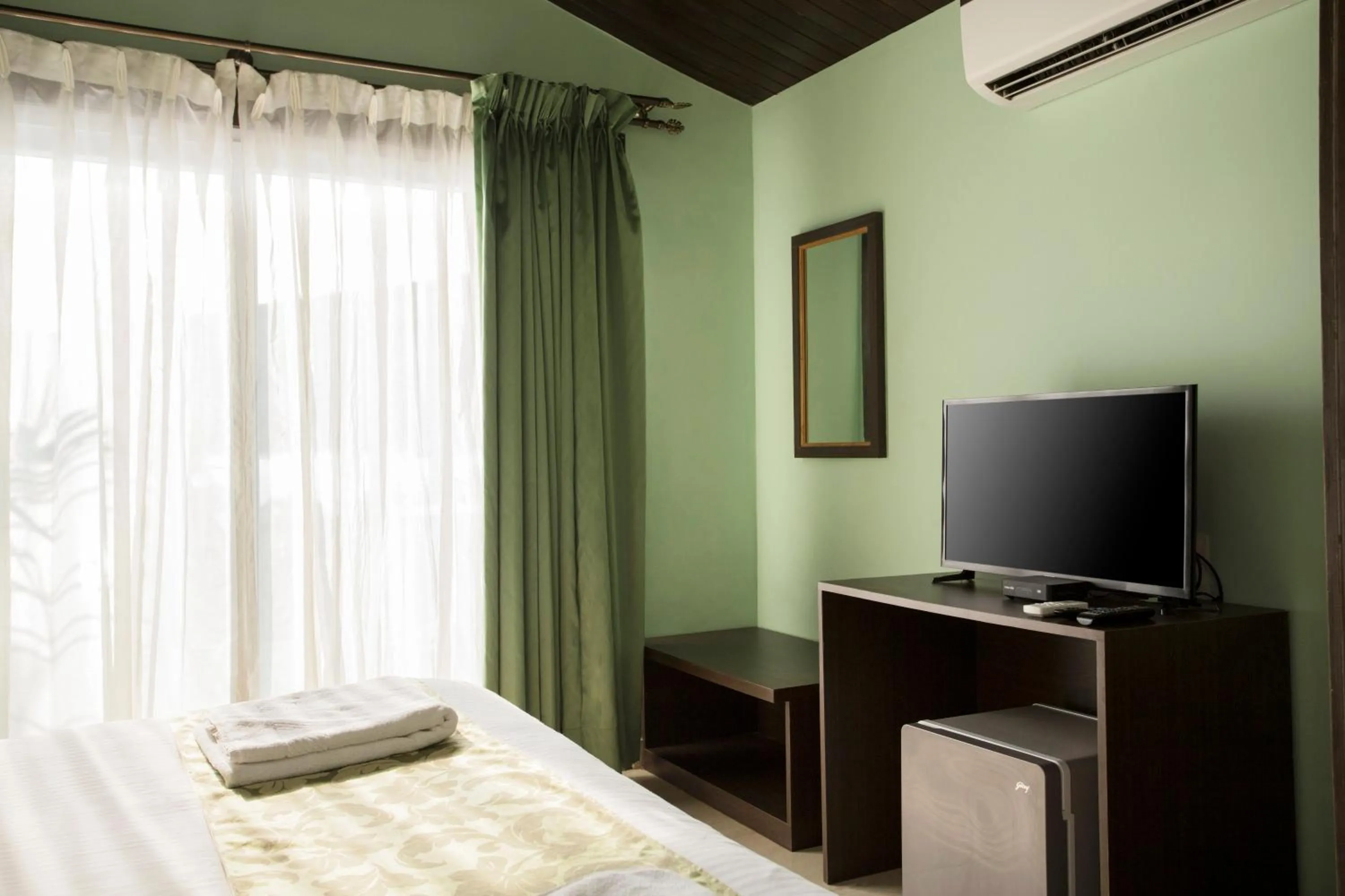 TV and multimedia, TV/Entertainment Center in Antares Beach Resort, Vagator