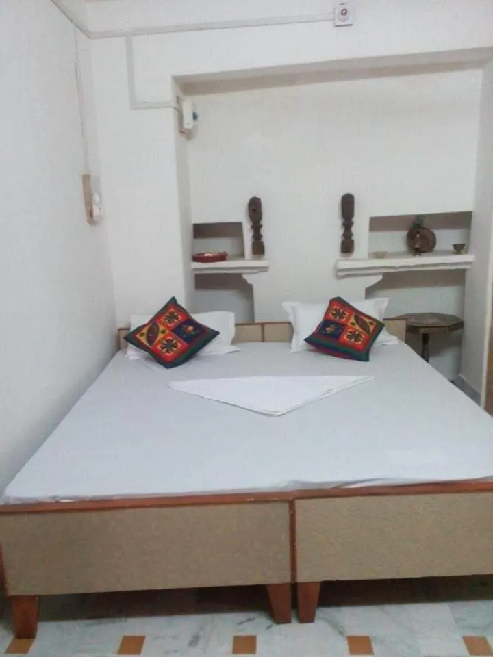 Bed in Shiva Guest House