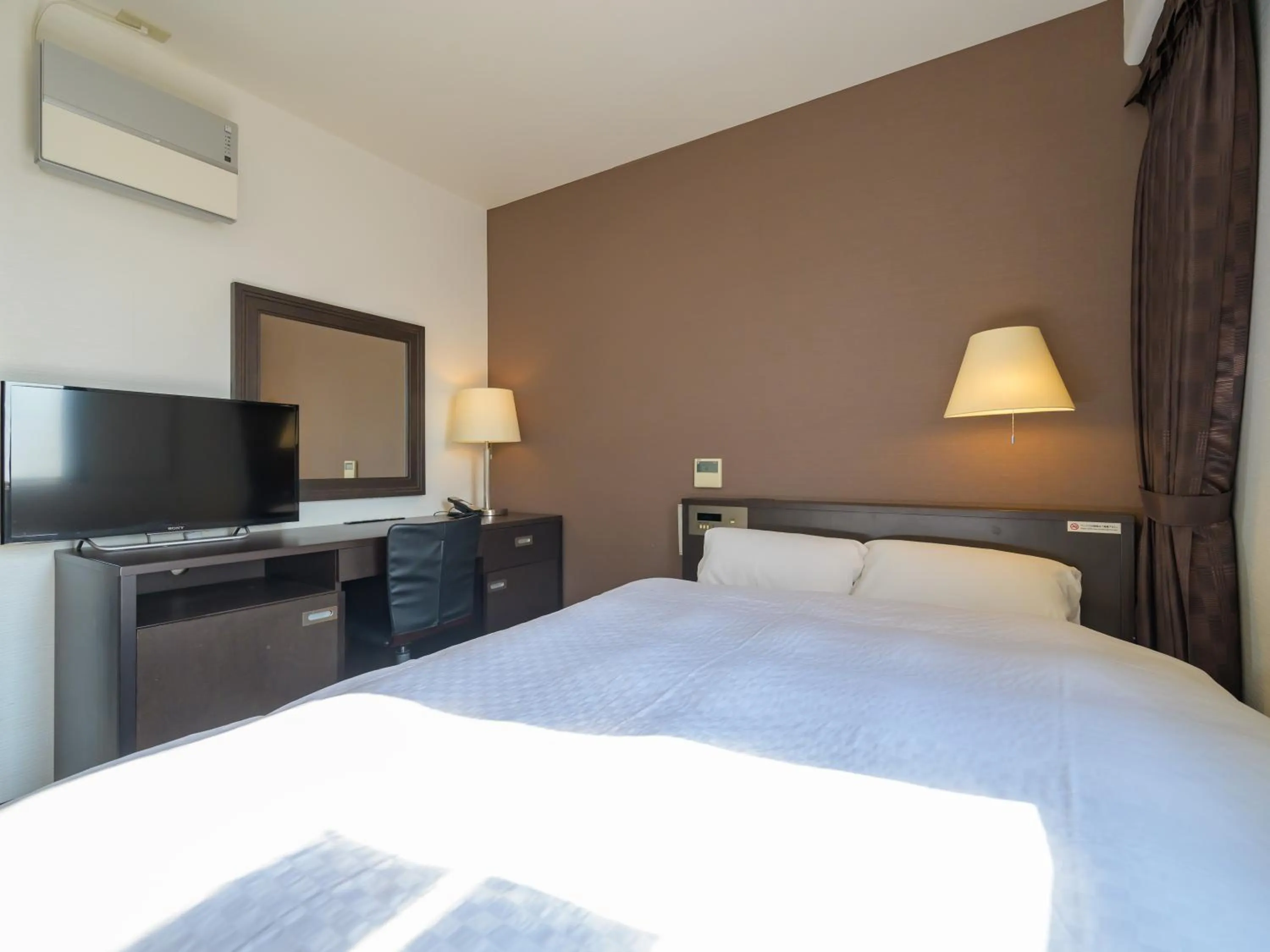 Photo of the whole room, Bed in Centre One Hotel Handa