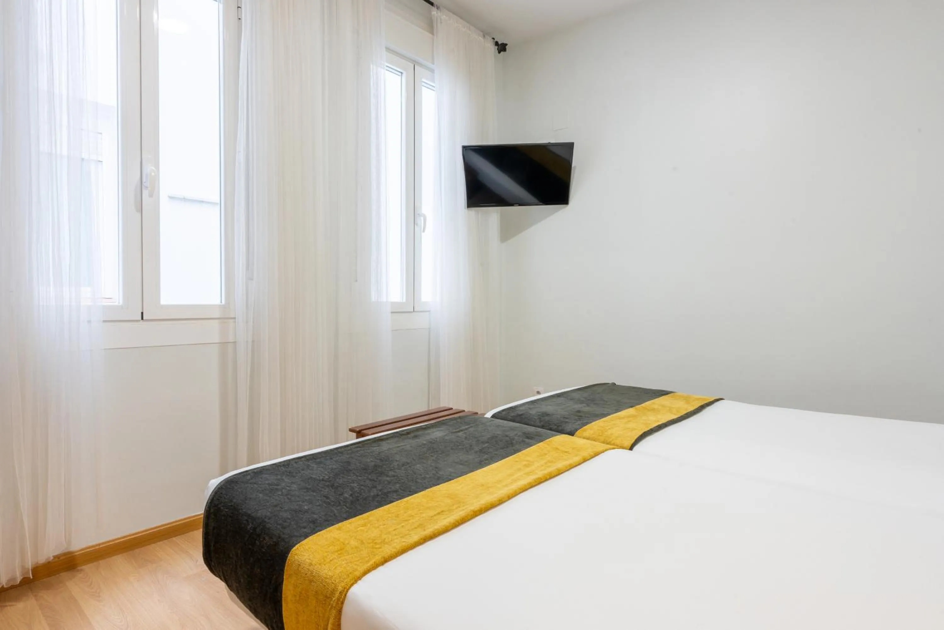 Bed in Smartr Madrid Chueca