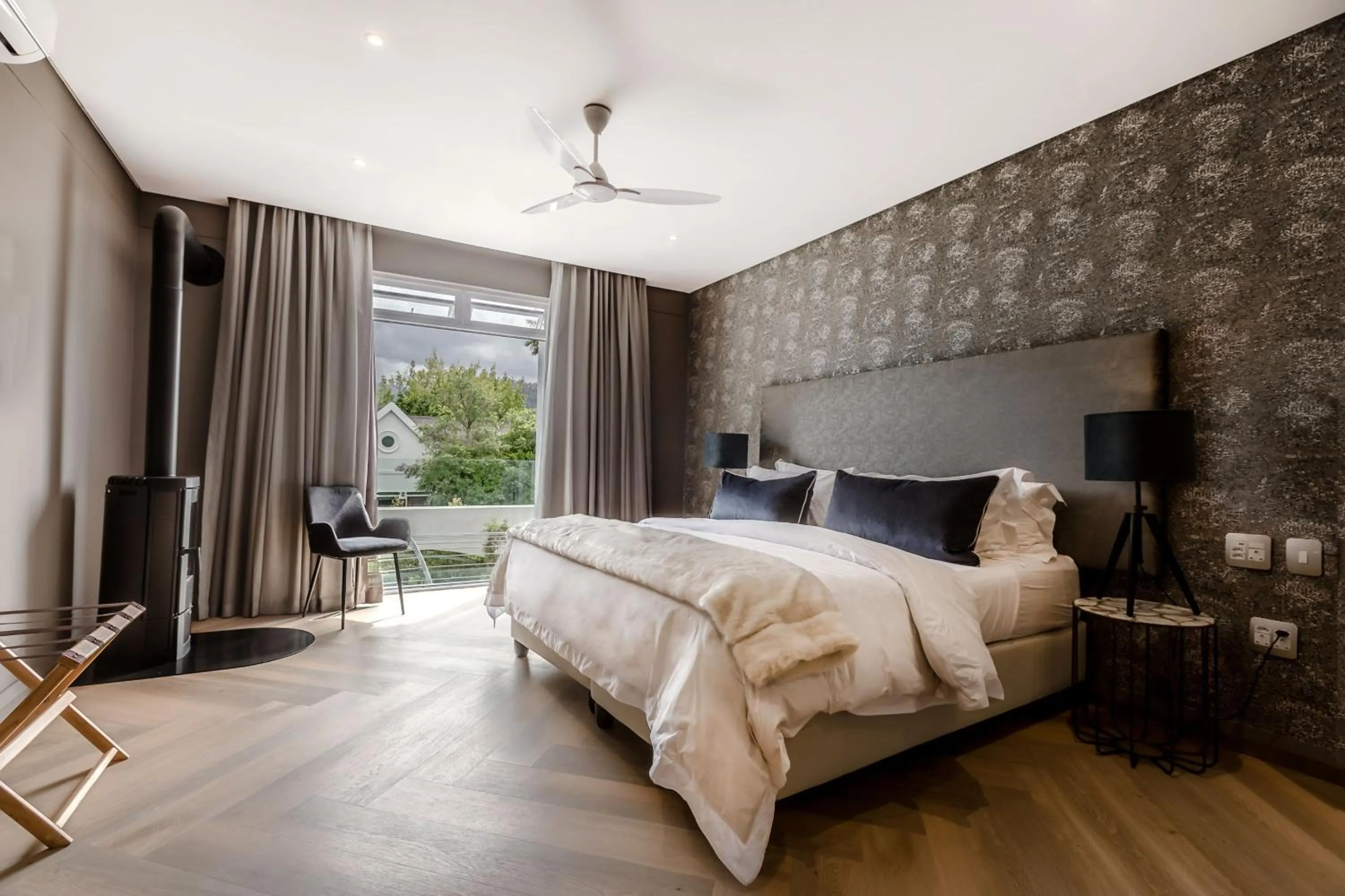 Photo of the whole room, Bed in Franschhoek Boutique Hotel - Lion Roars Hotels & Lodges