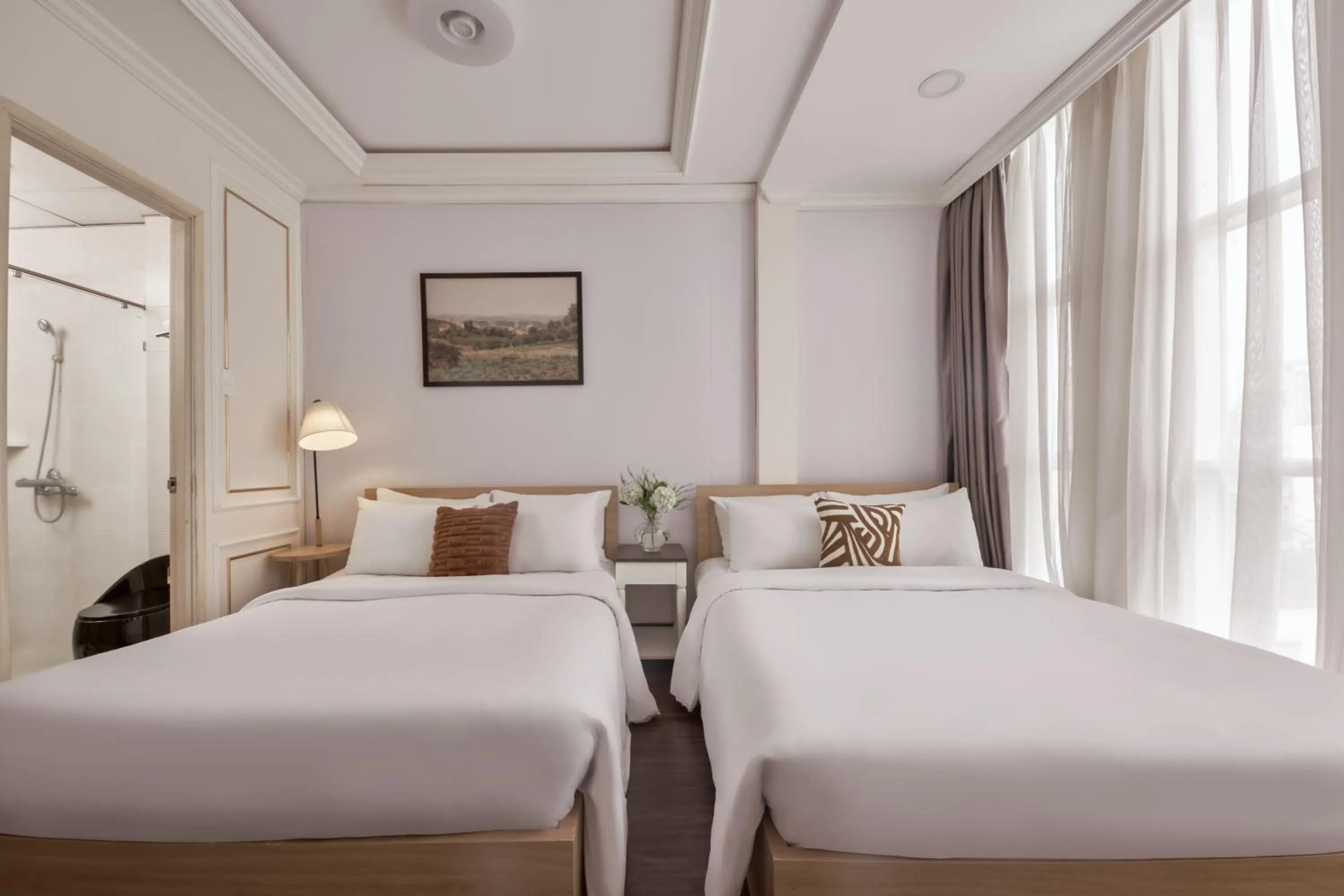 Bed in Quy Hung Hotel And Spa Central