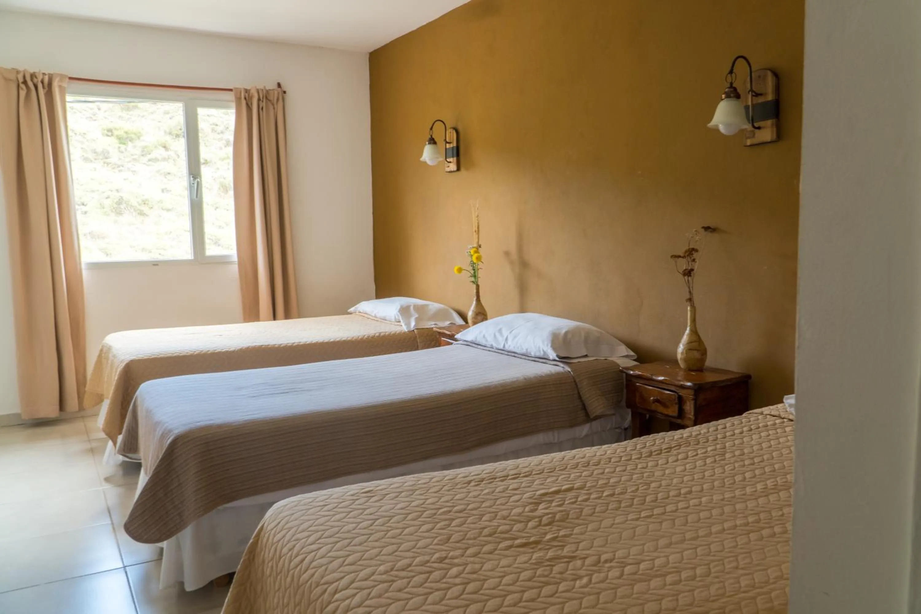 Photo of the whole room, Bed in Hosteria Alma de Patagonia