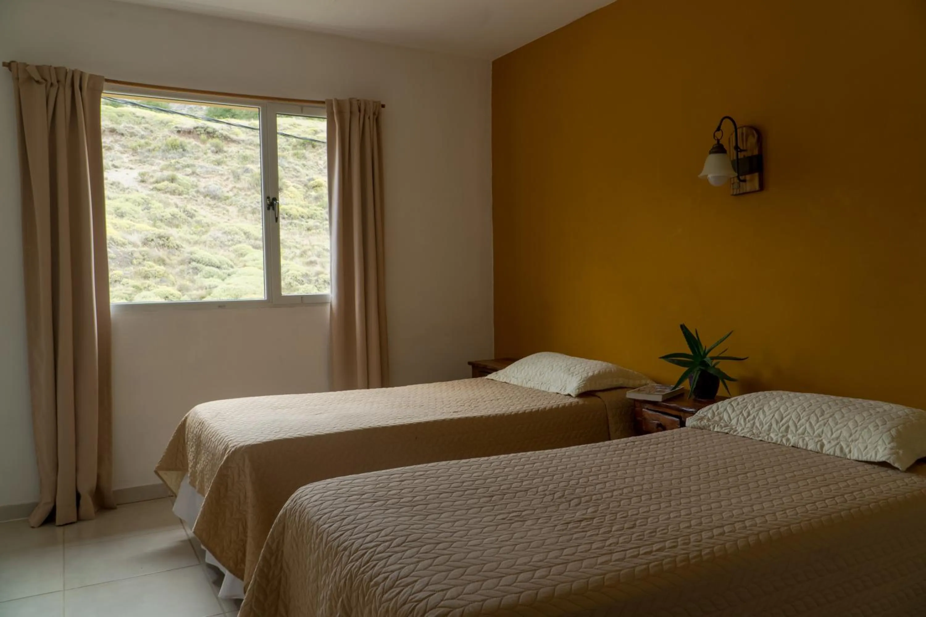 Photo of the whole room, Bed in Hosteria Alma de Patagonia